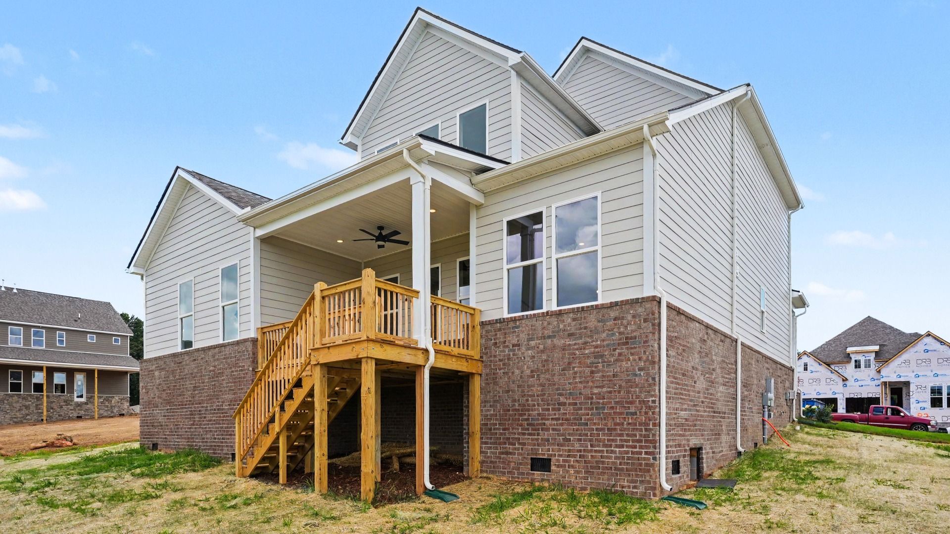 Rear exterior with view of covered patio