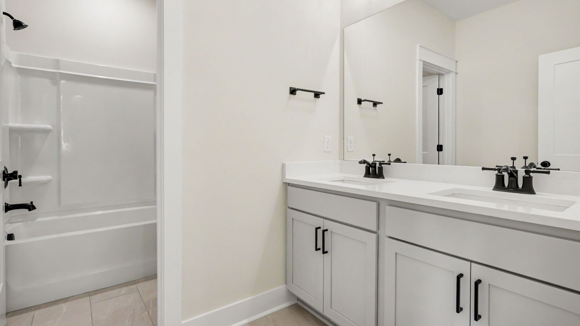 Secondary bathroom with dual vanity
