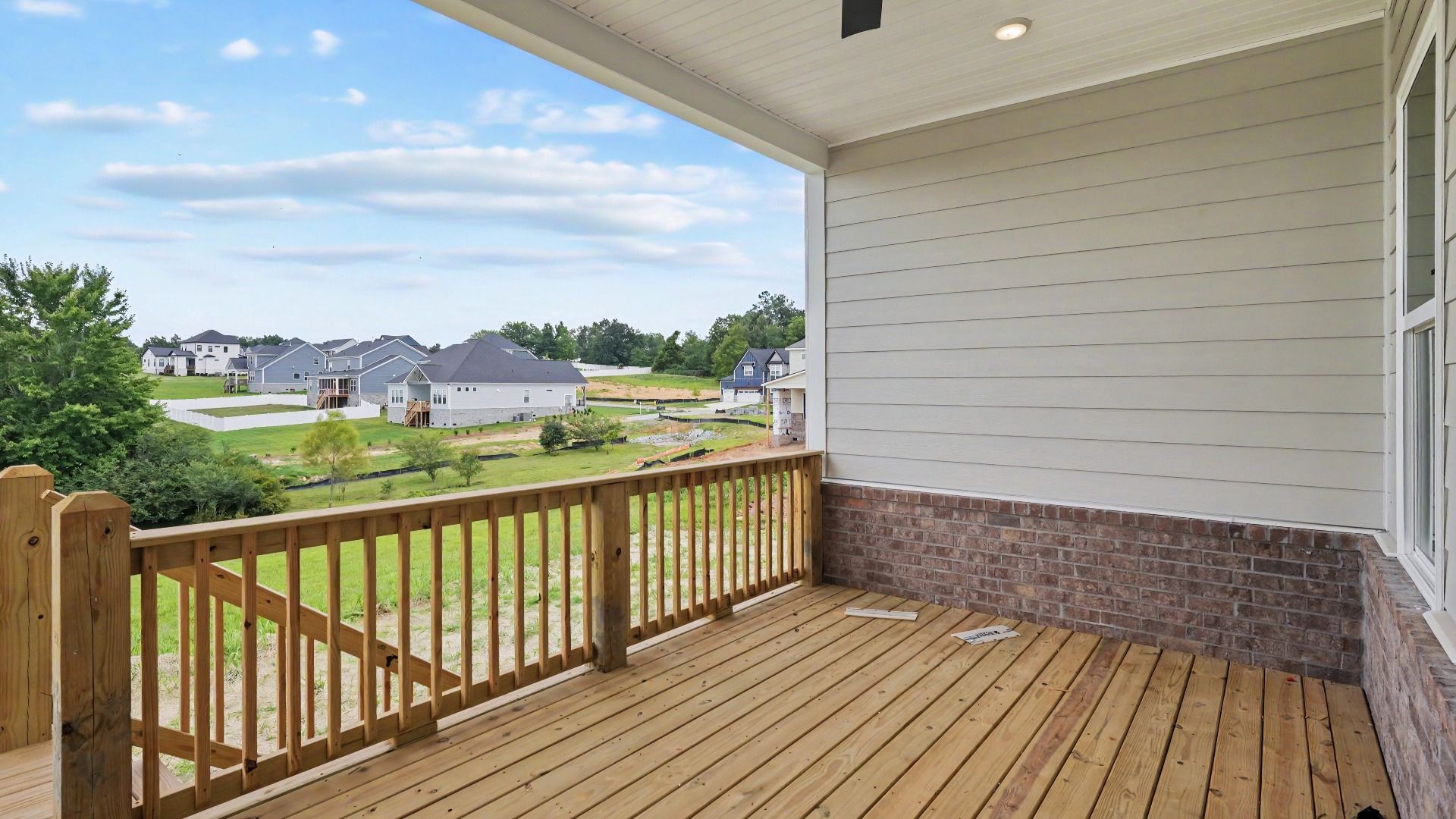 Covered rear patio with ceiling fan
