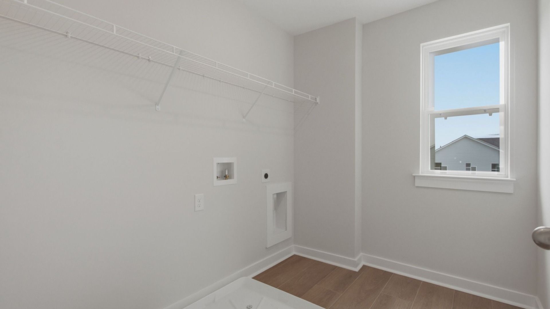 Dedicated laundry room with natural light