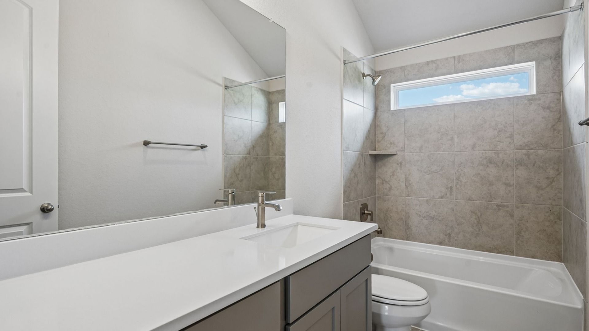 Secondary bathroom with window for naturl light
