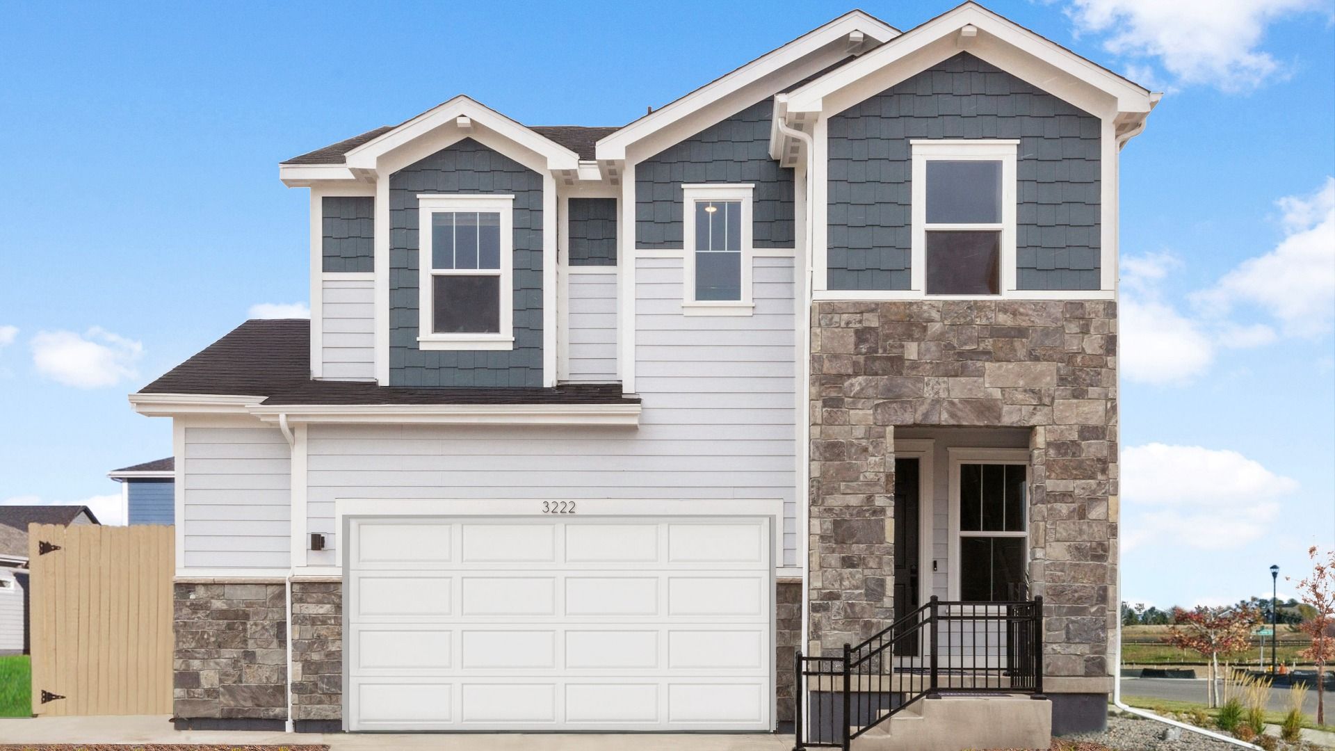 Beautiful two-story home exterior showcasing thoughtful design and curb appeal.