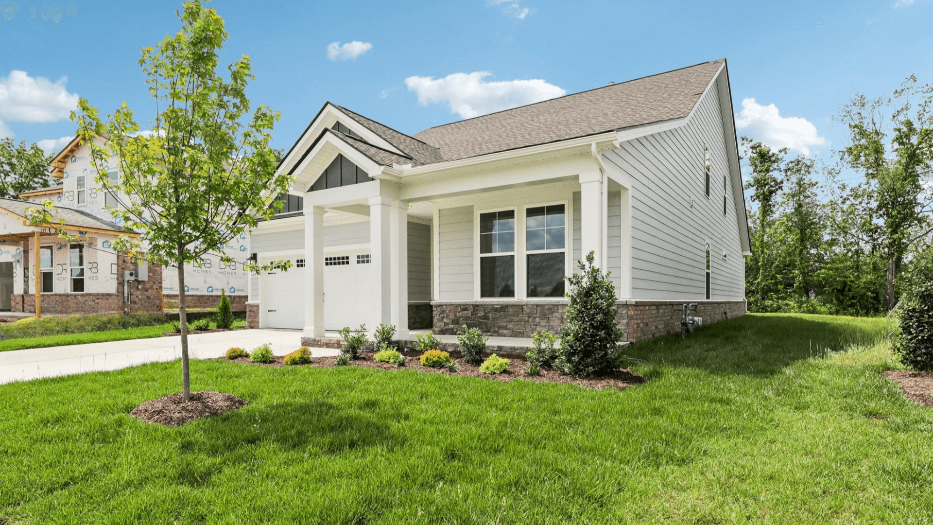 Front exterior with 2-car garage