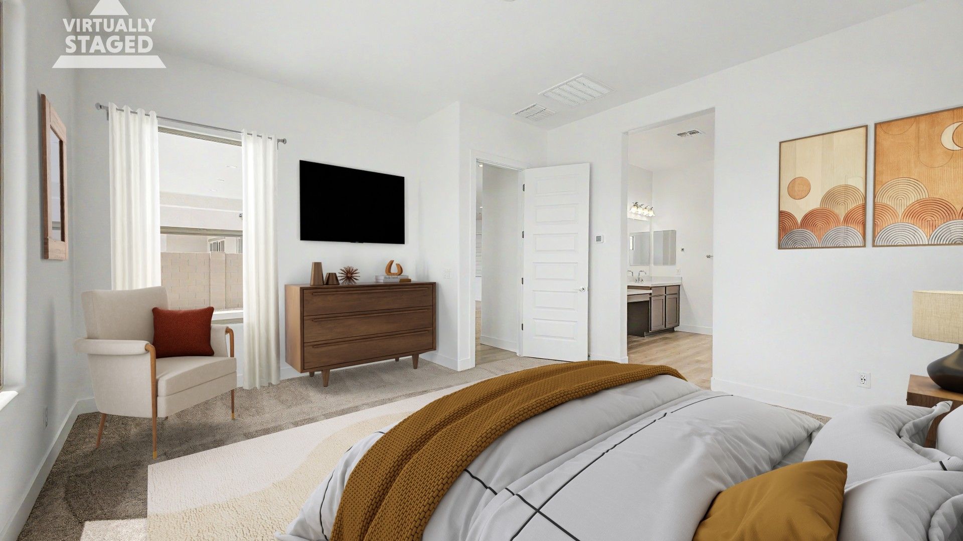 Staged primary bedroom in move-in ready home by DRB Homes at Hacienda at Estrella, 16825 W. Ardmore Road, Goodyear, AZ 85338.