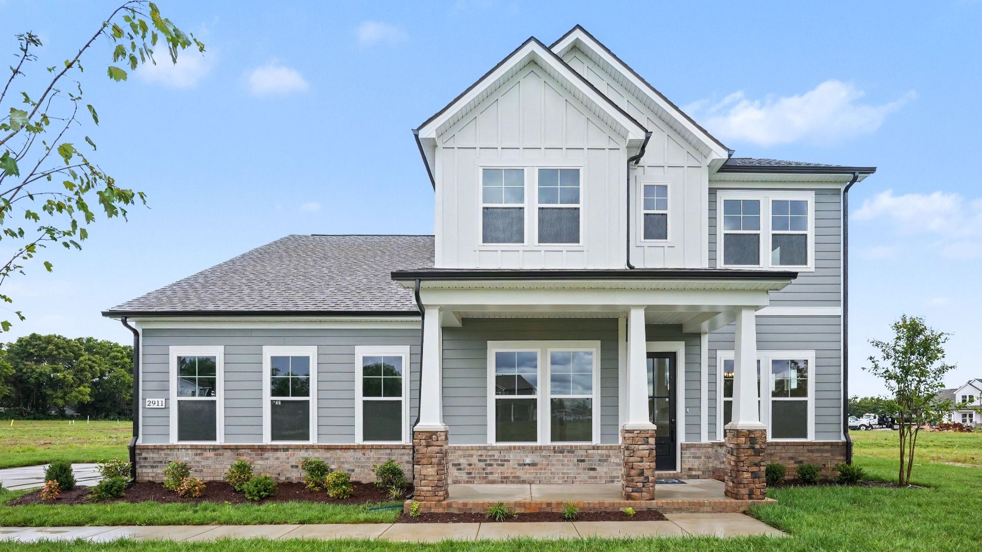 Exterior of an Elate II plan with a side entry garage built at Northridge Park in Murfreesboro, TN