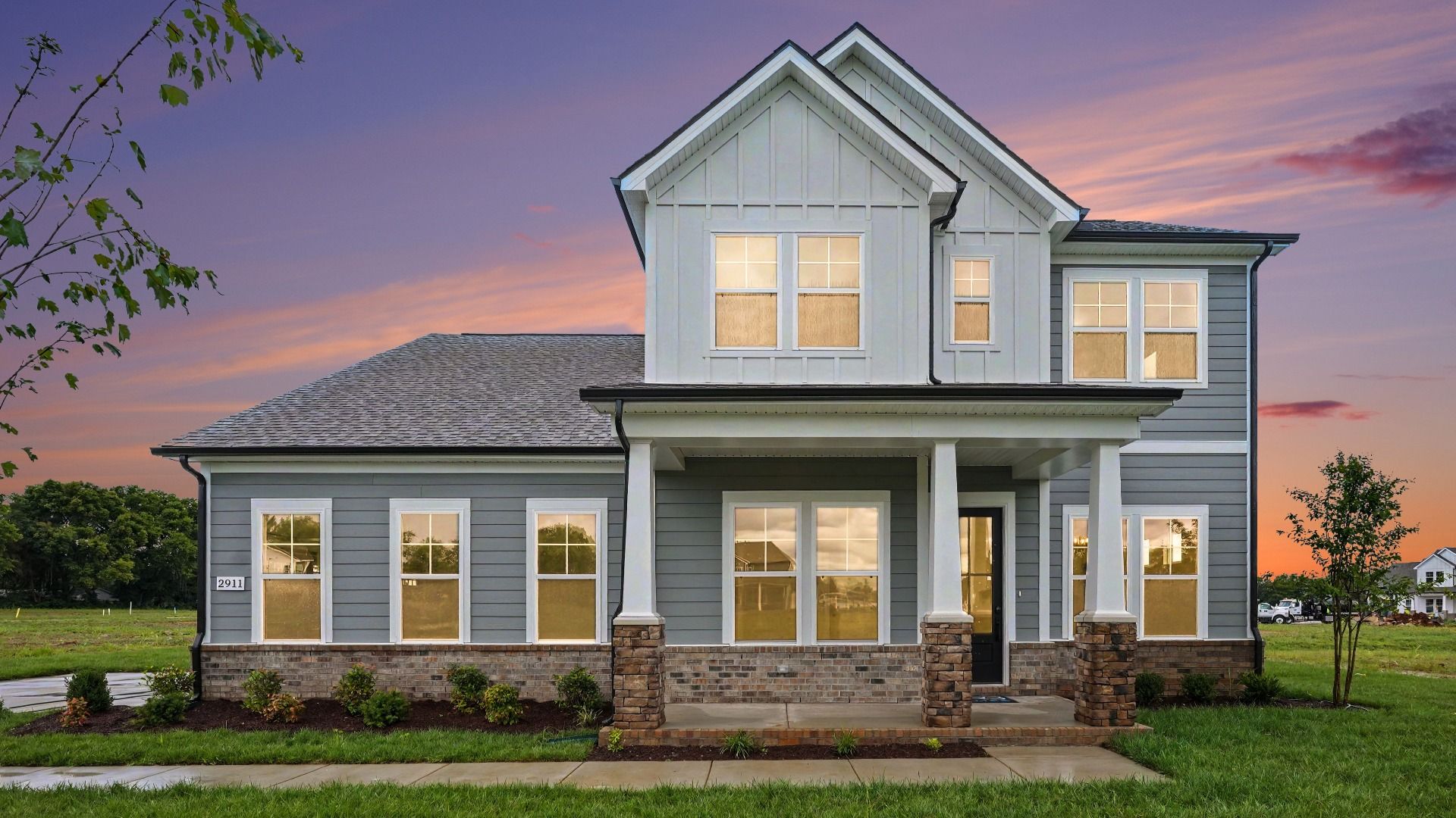 Exterior of an Elate II plan with a side entry garage built at Northridge Park in Murfreesboro, TN