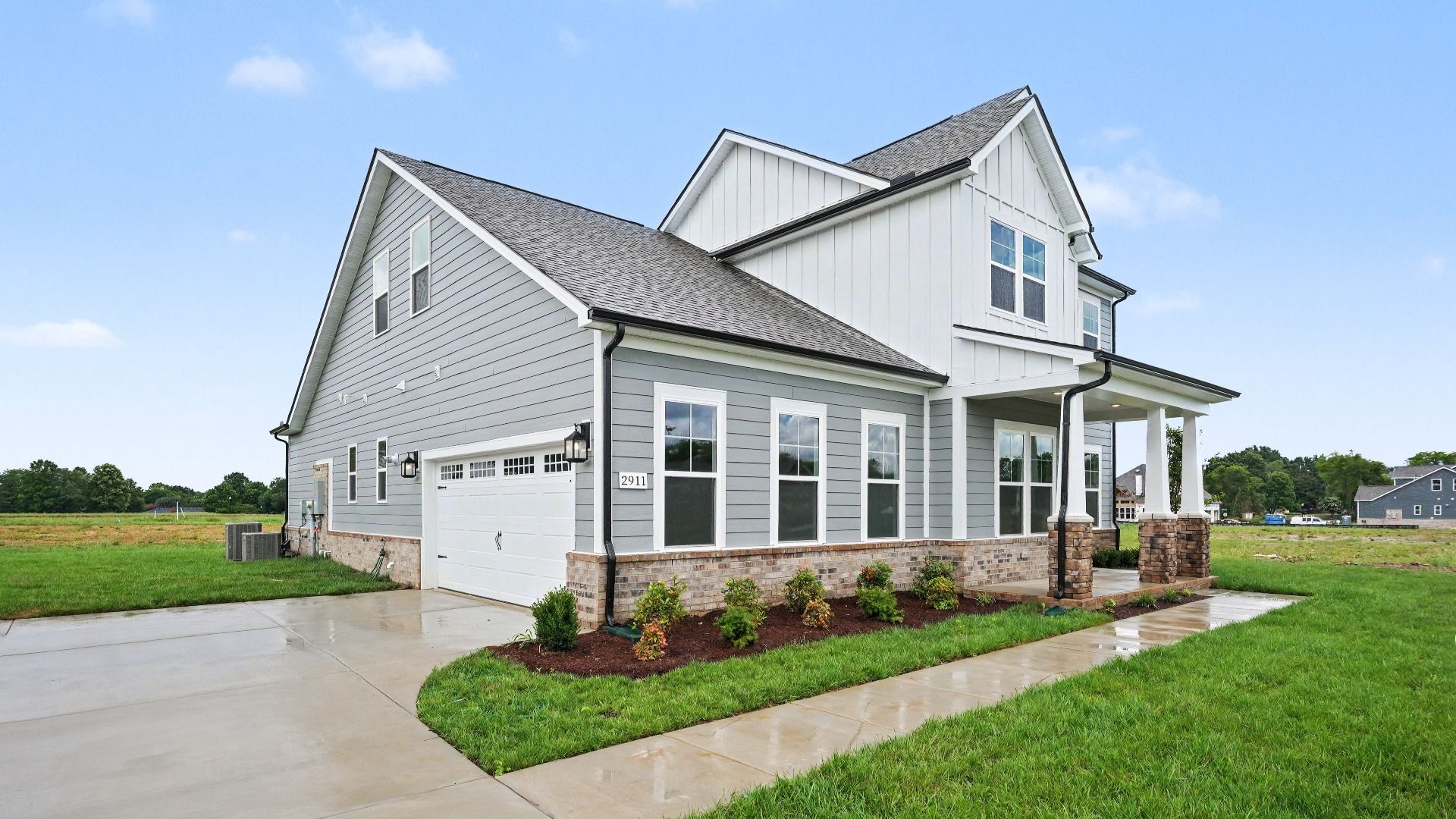 Exterior of an Elate II plan with a side entry garage built at Northridge Park in Murfreesboro, TN