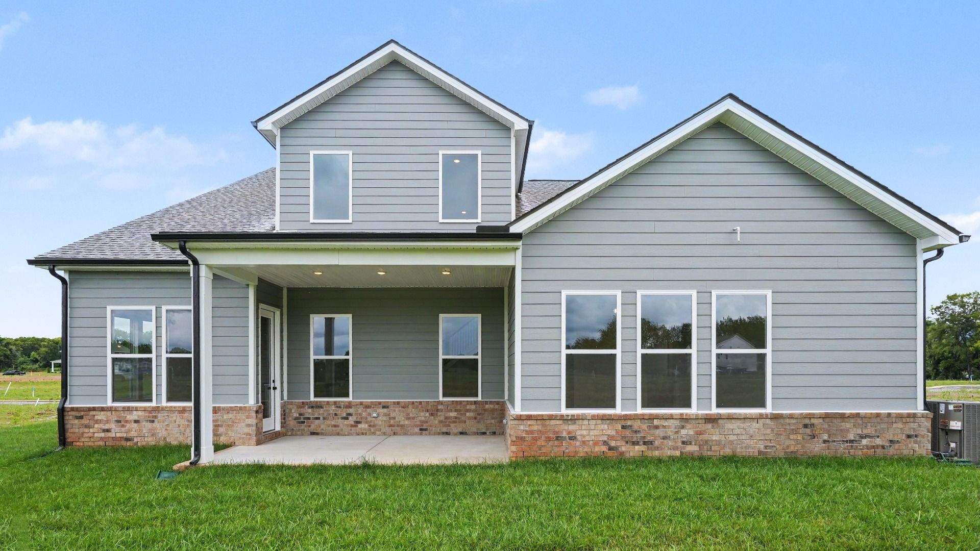 Rear exterior of an Elate II plan with covered patio built at Northridge Park in Murfreesboro, TN