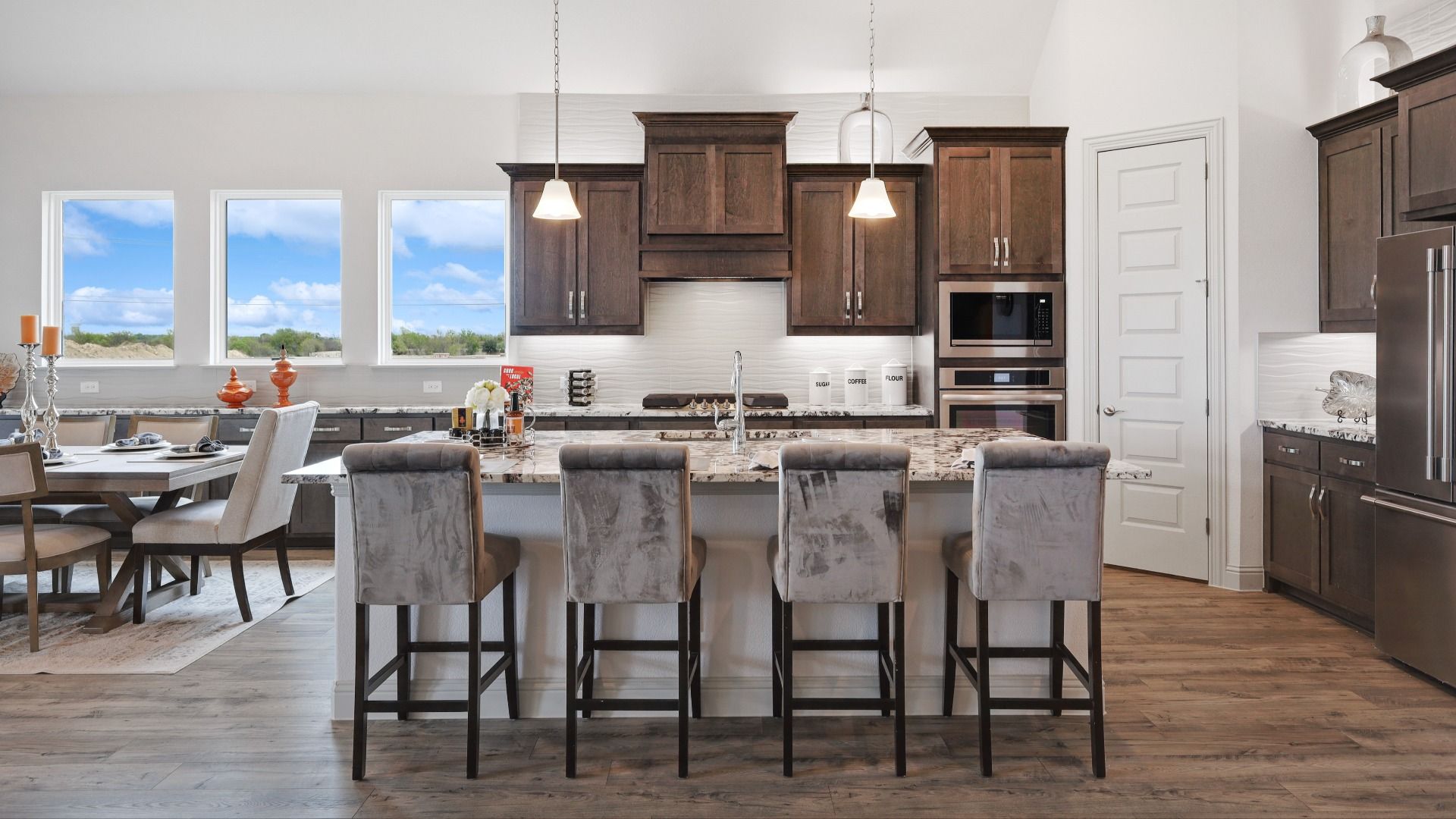 Model home photos of similar floorplans, not pictures of actual home.