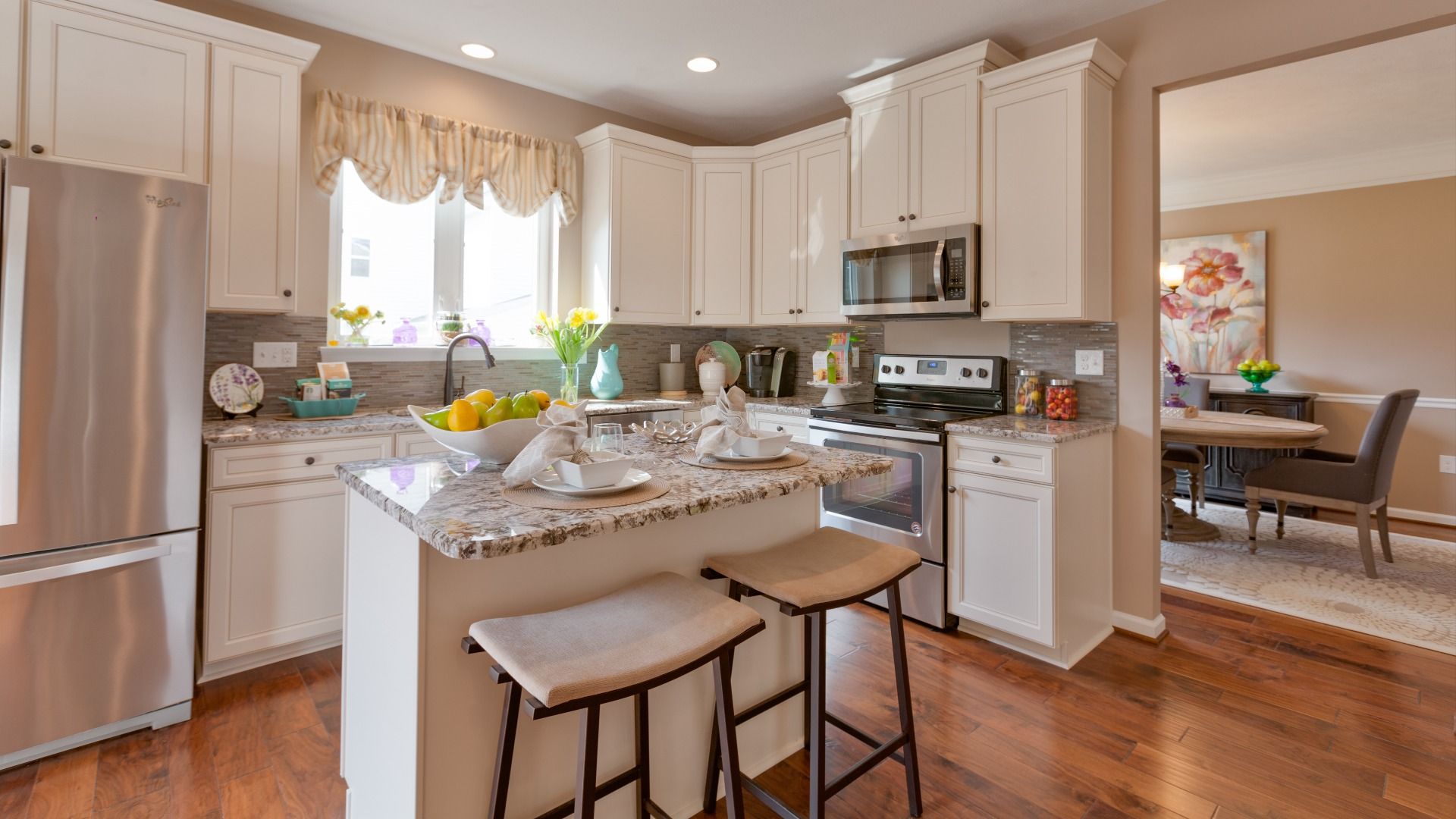 Model home photos of similar floorplans, not pictures of actual home.