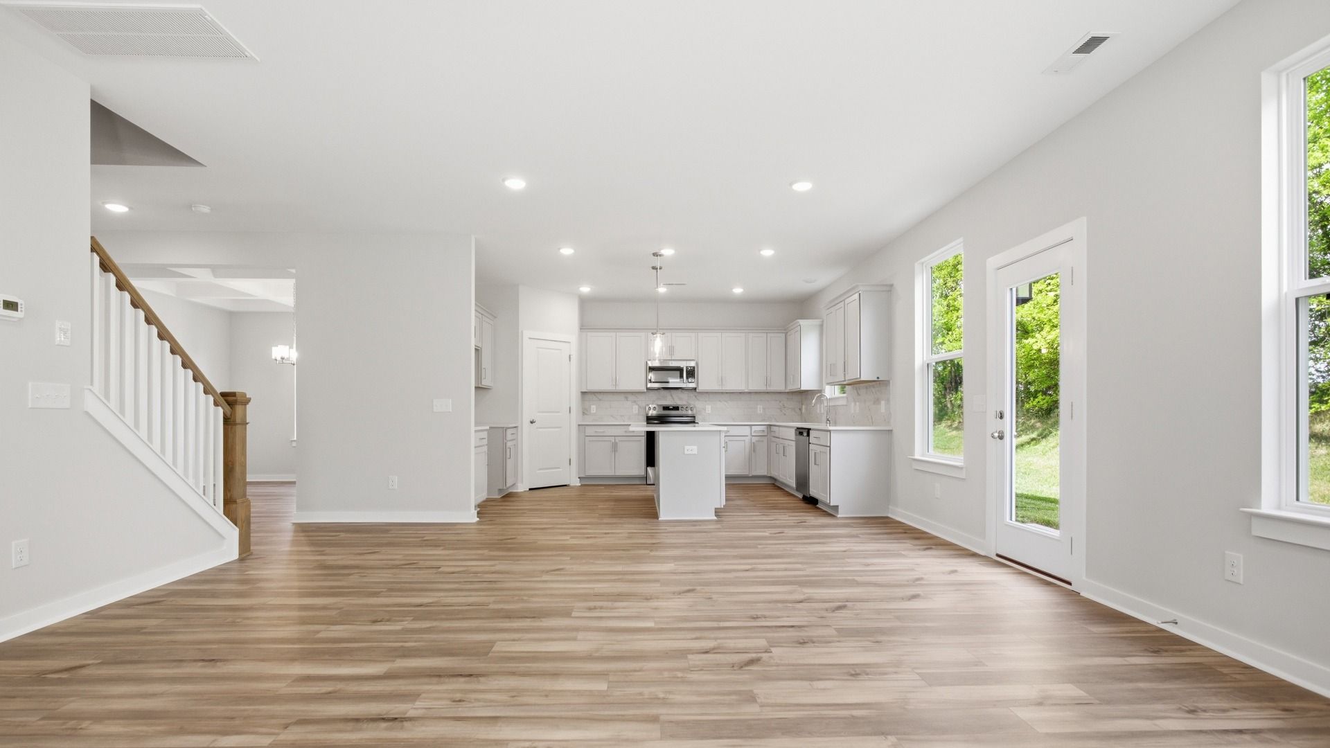 View of the Wynwood plan first floor from the living room towards the large kitchen
