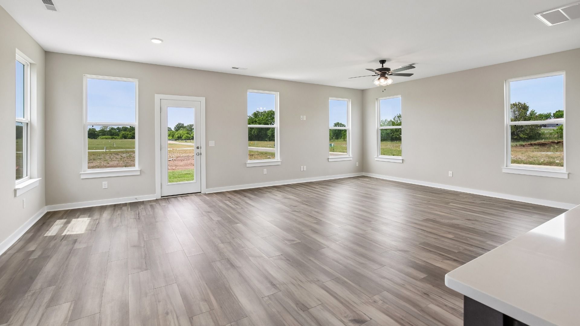 First Floor with hard surface flooring and bright natural light through windows