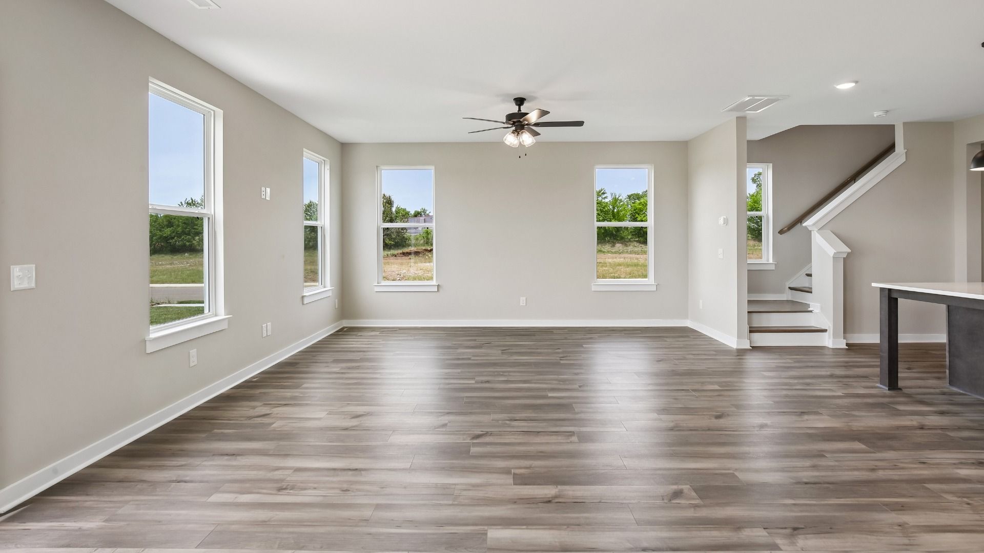 First Floor with hard surface flooring and bright natural light through windows
