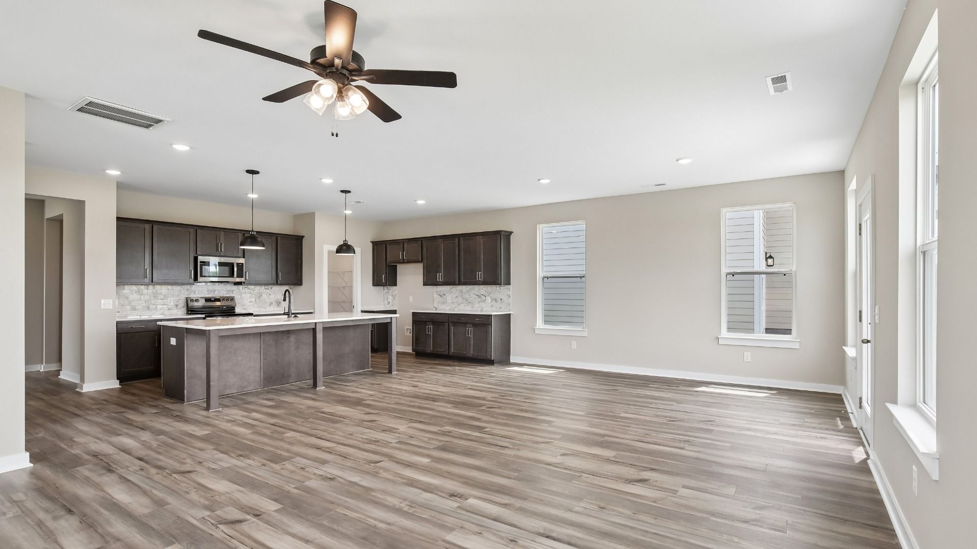 Image of First Floor with hard surface flooring and kitchen
