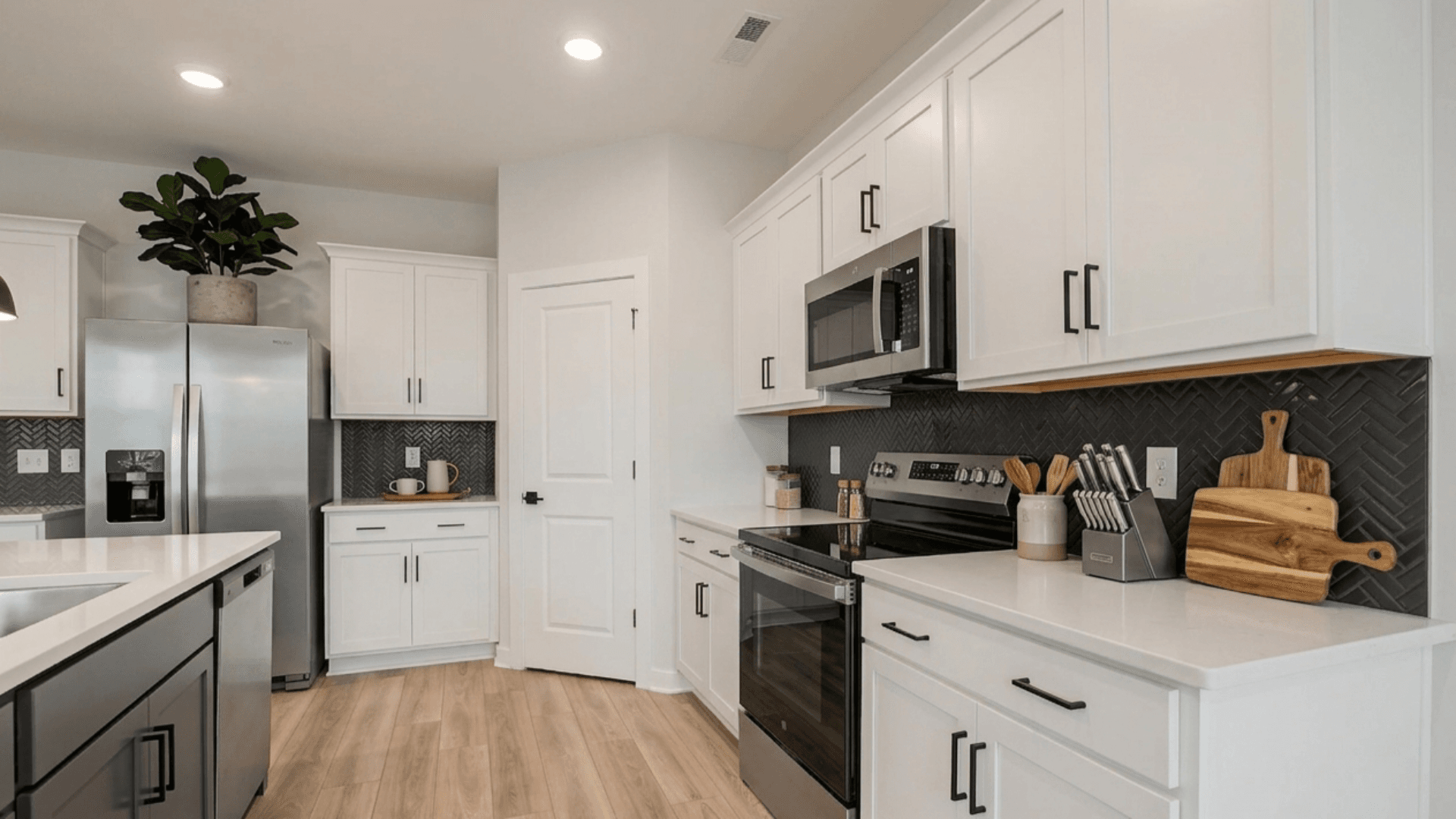 Virtually staged kitchen with decor and fridge