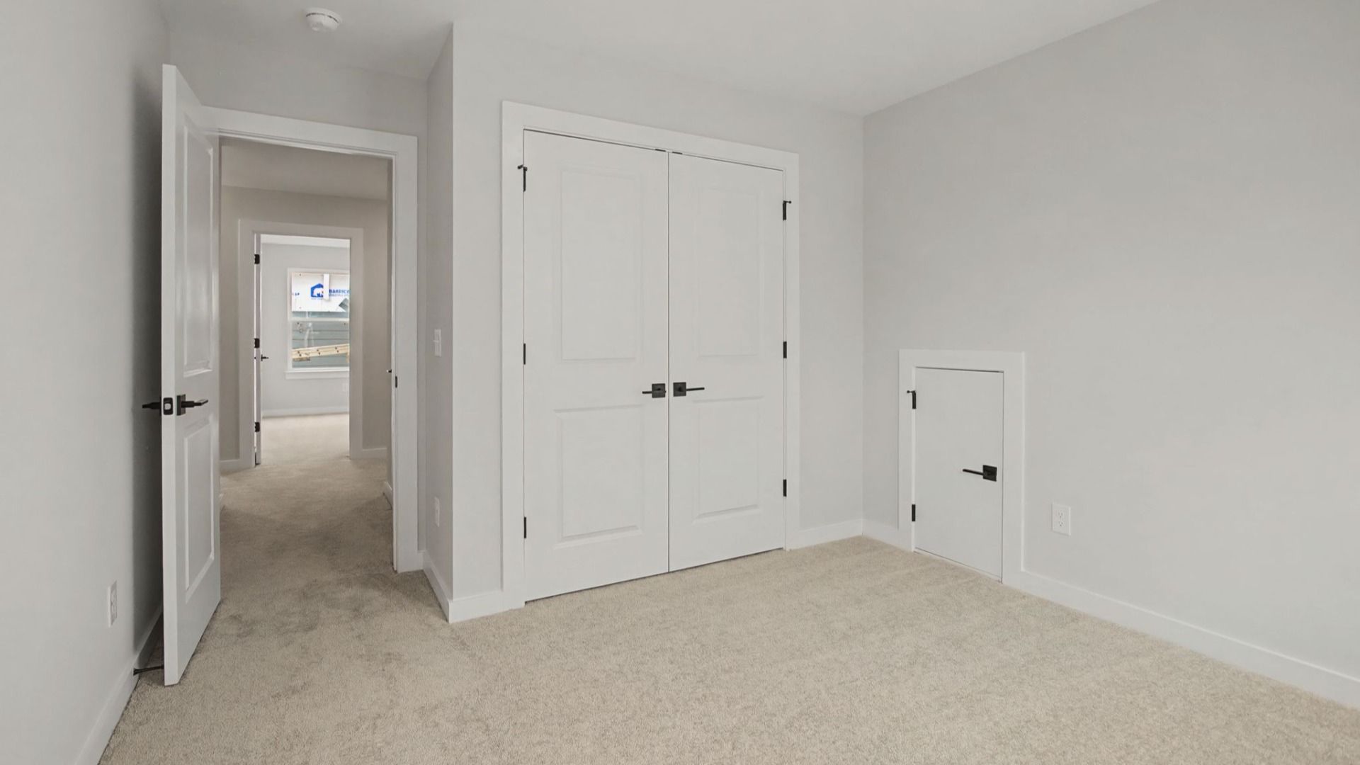 Second floor bedroom with closet and storage area
