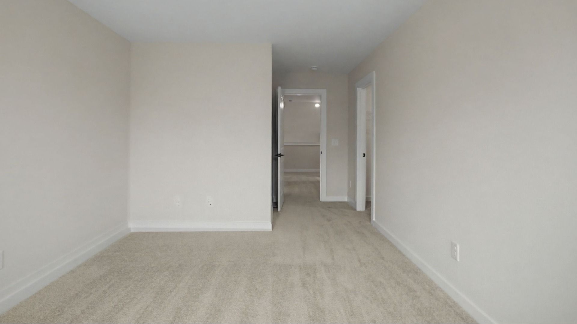 Larger secondary bedroom with walk-in closet and en-suite bathroom