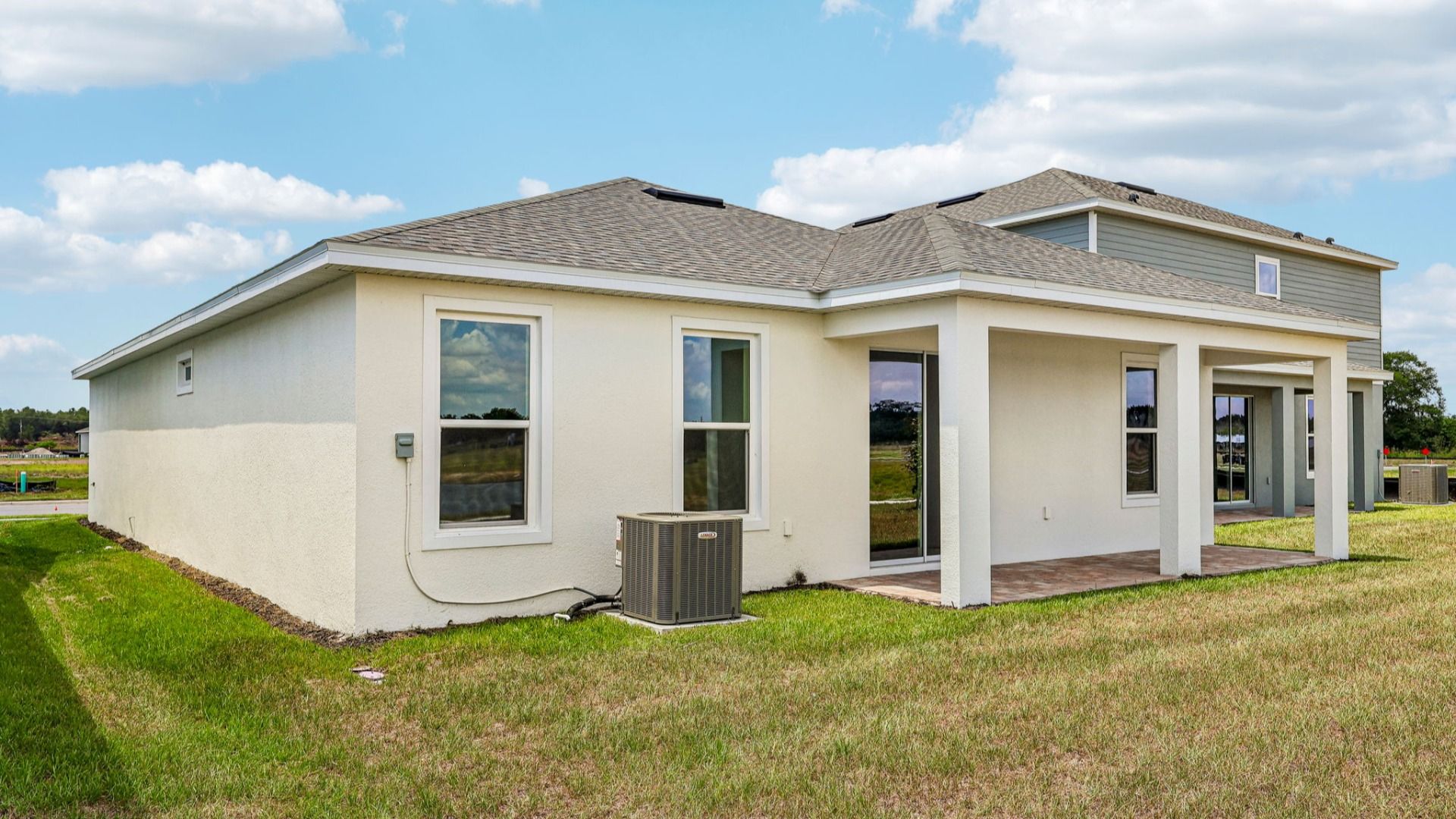 Buttonwood Rear Elevation Floor Plan Exterior by DRB Homes in Ardisia Park in New Smyrna Beach