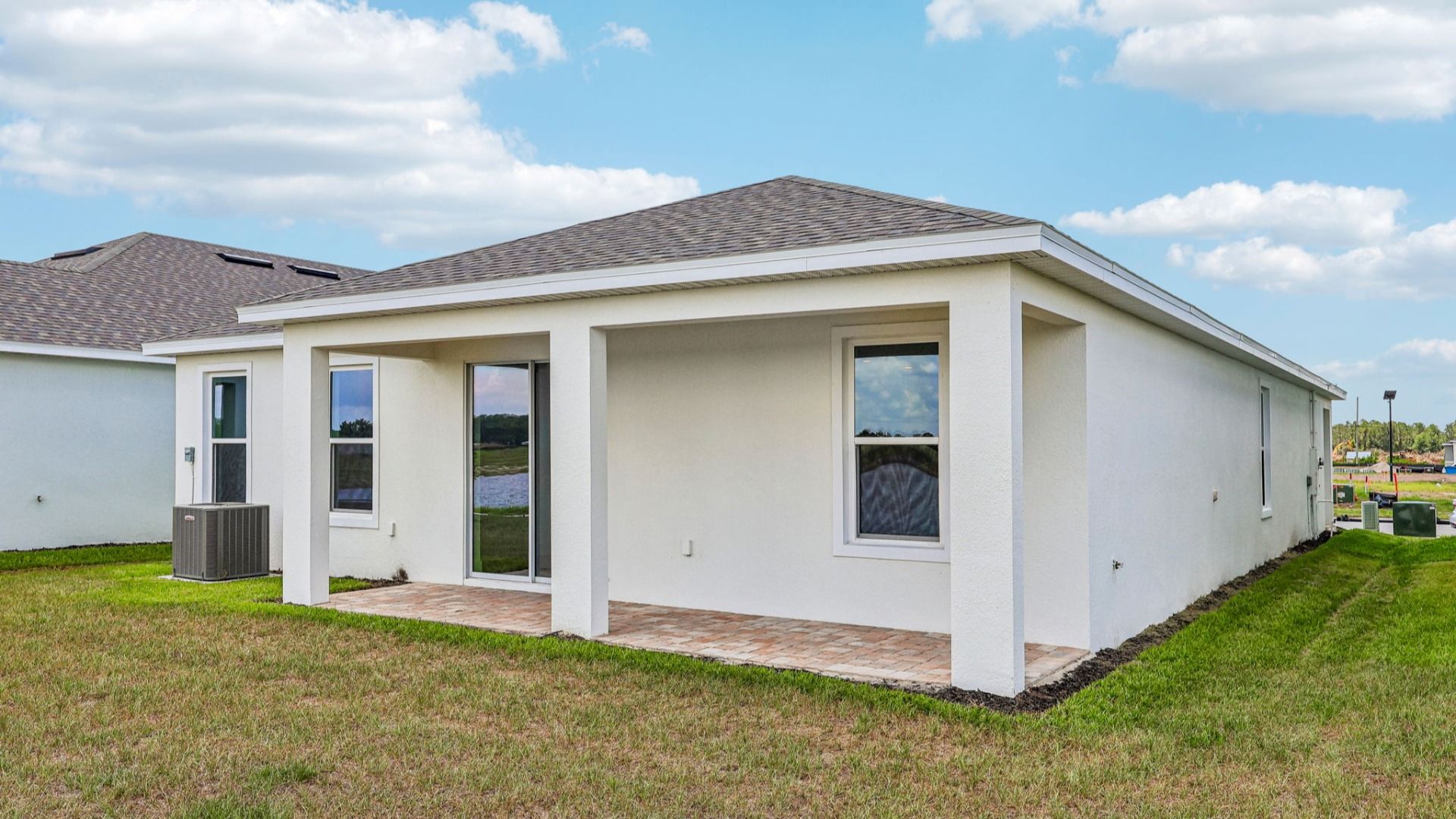 Buttonwood Rear Elevation Floor Plan Exterior by DRB Homes in Ardisia Park in New Smyrna Beach
