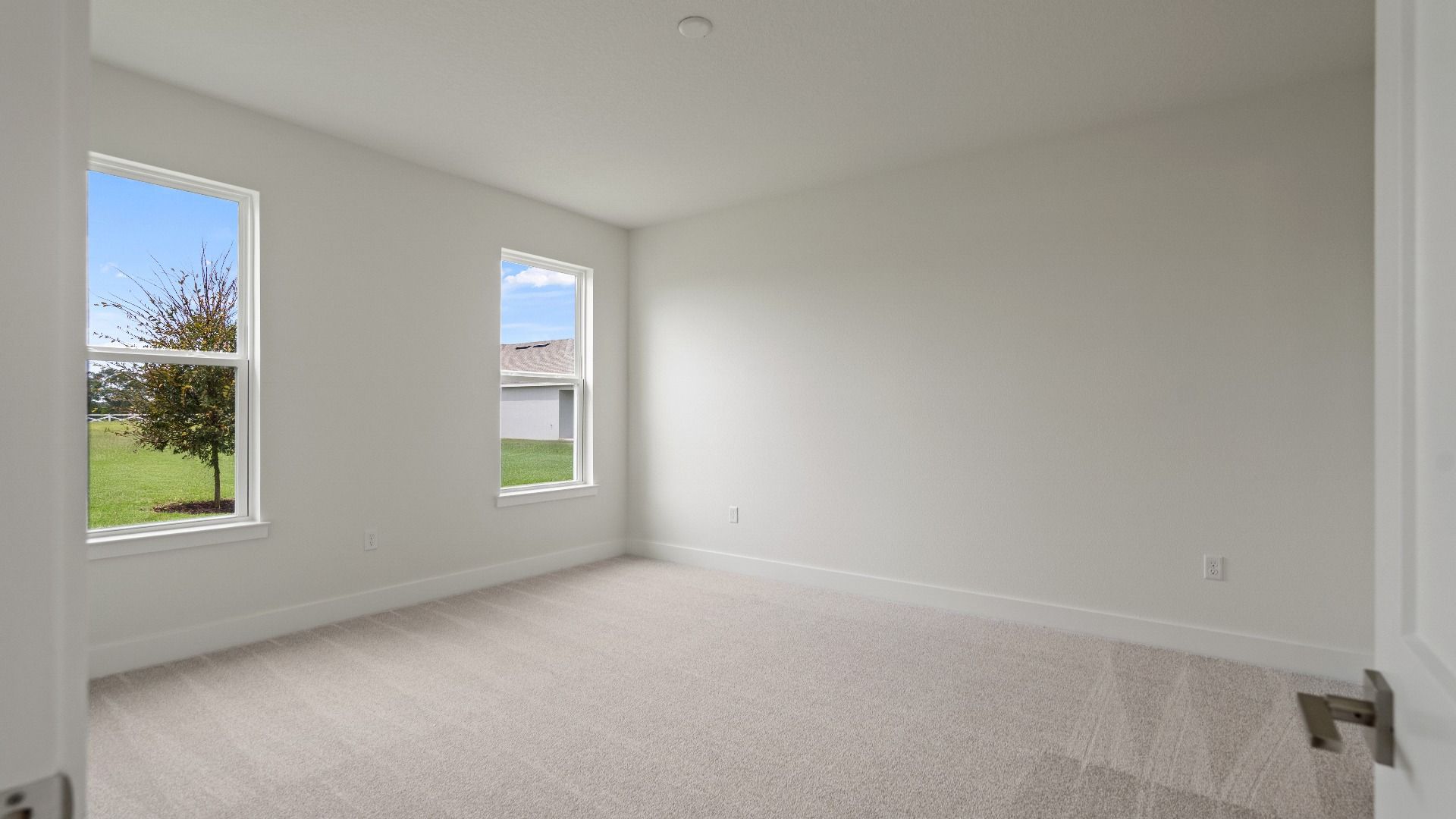 Secondary Bedroom in the Buttonwood Floor Plan by DRB Homes in Ardisia Park in New Smyrna Beach