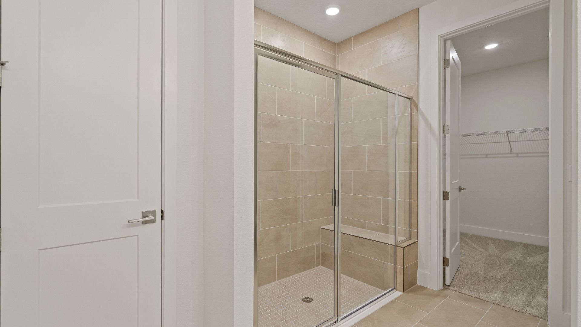 Primary En Suite Bath in the Buttonwood Floor Plan by DRB Homes in Ardisia Park in New Smyrna Beach