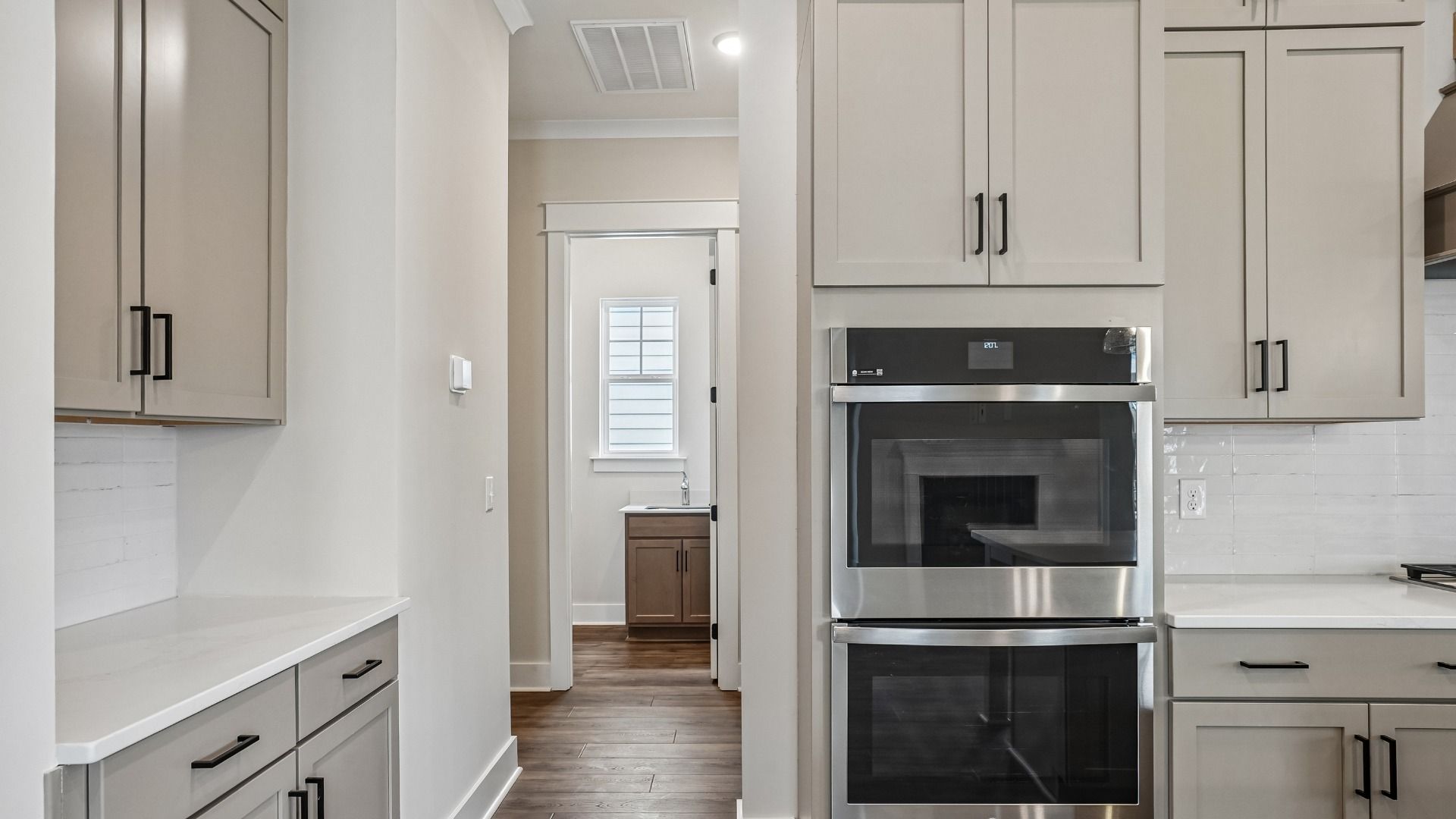 View of utility and garage access from the kitchen