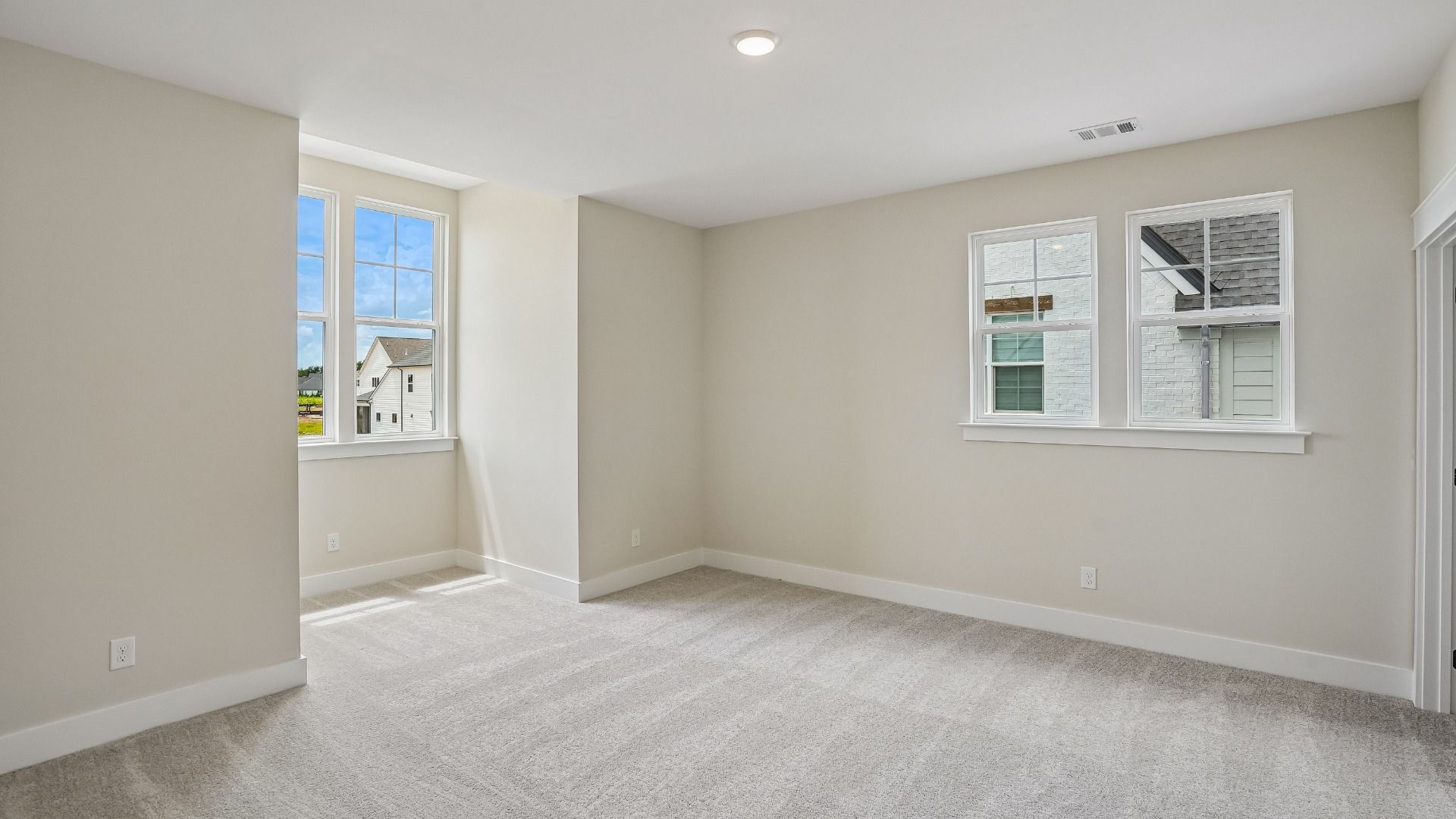 Guest Bedroom with windows and dormer
