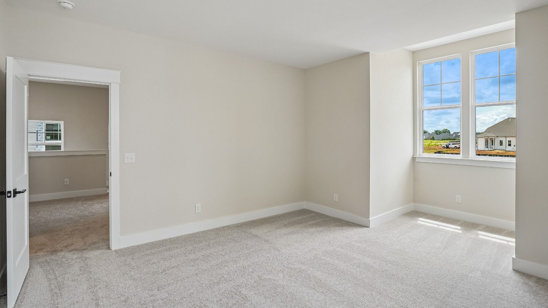 Guest Bedroom with windows and dormer