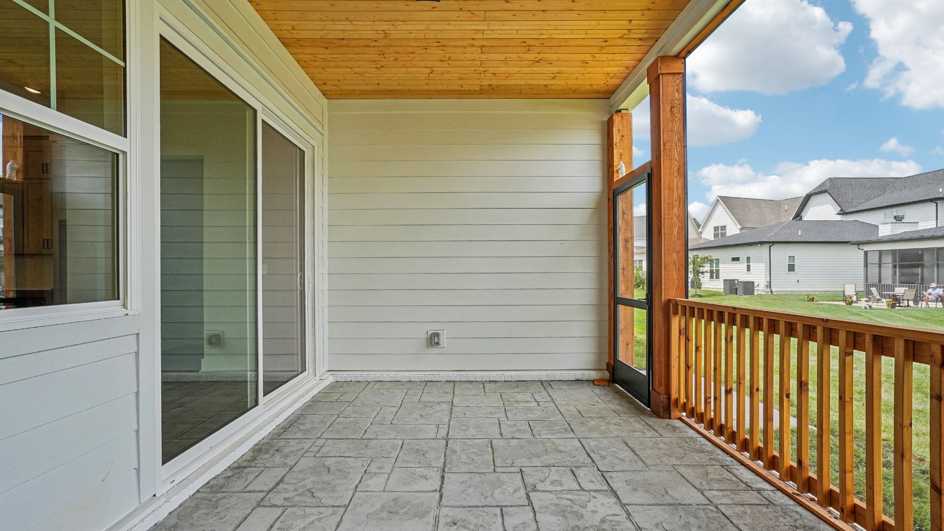 Covered and Screened-in Outdoor Space with fireplace