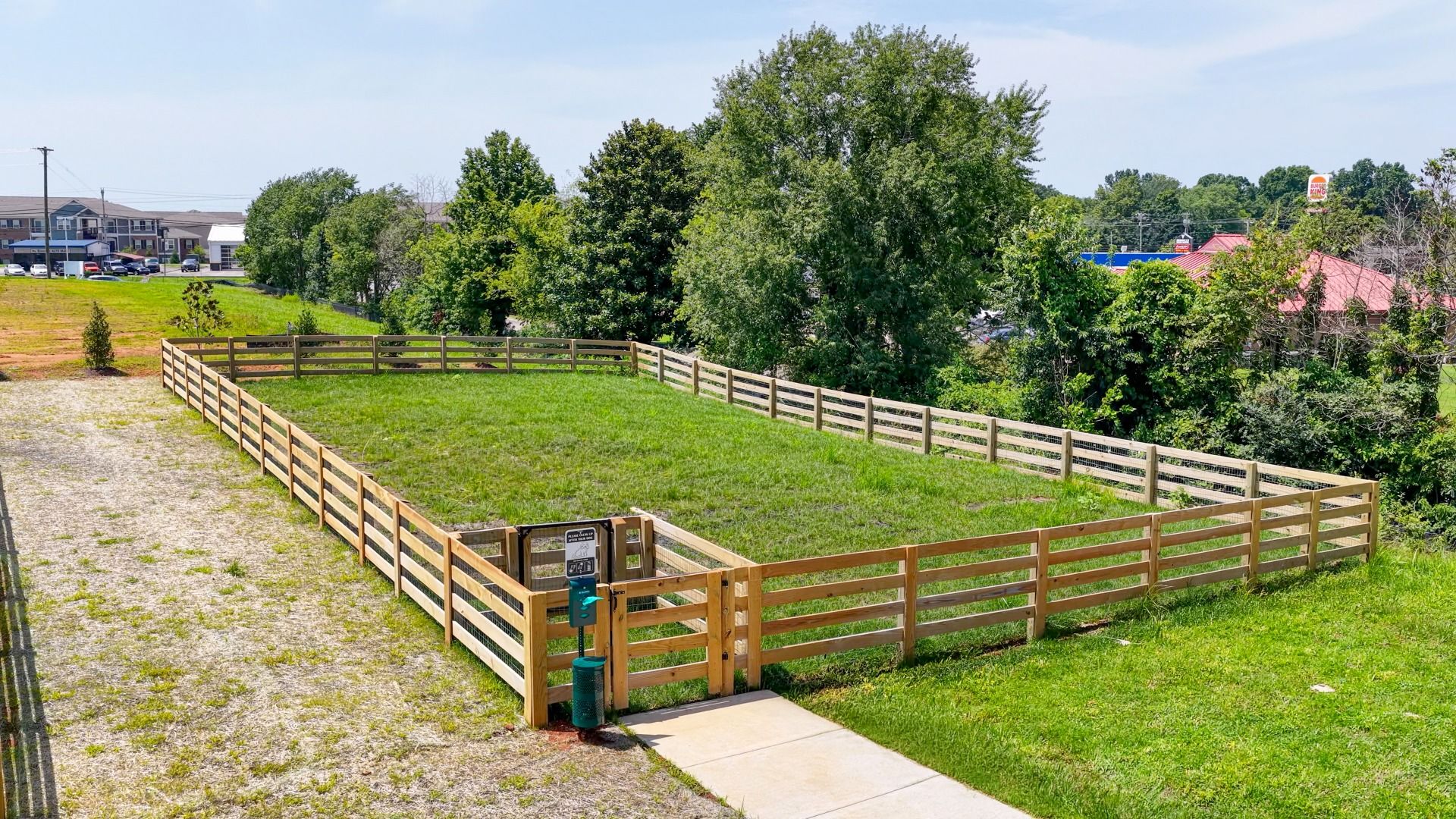 Enclosed grass area community dog park
