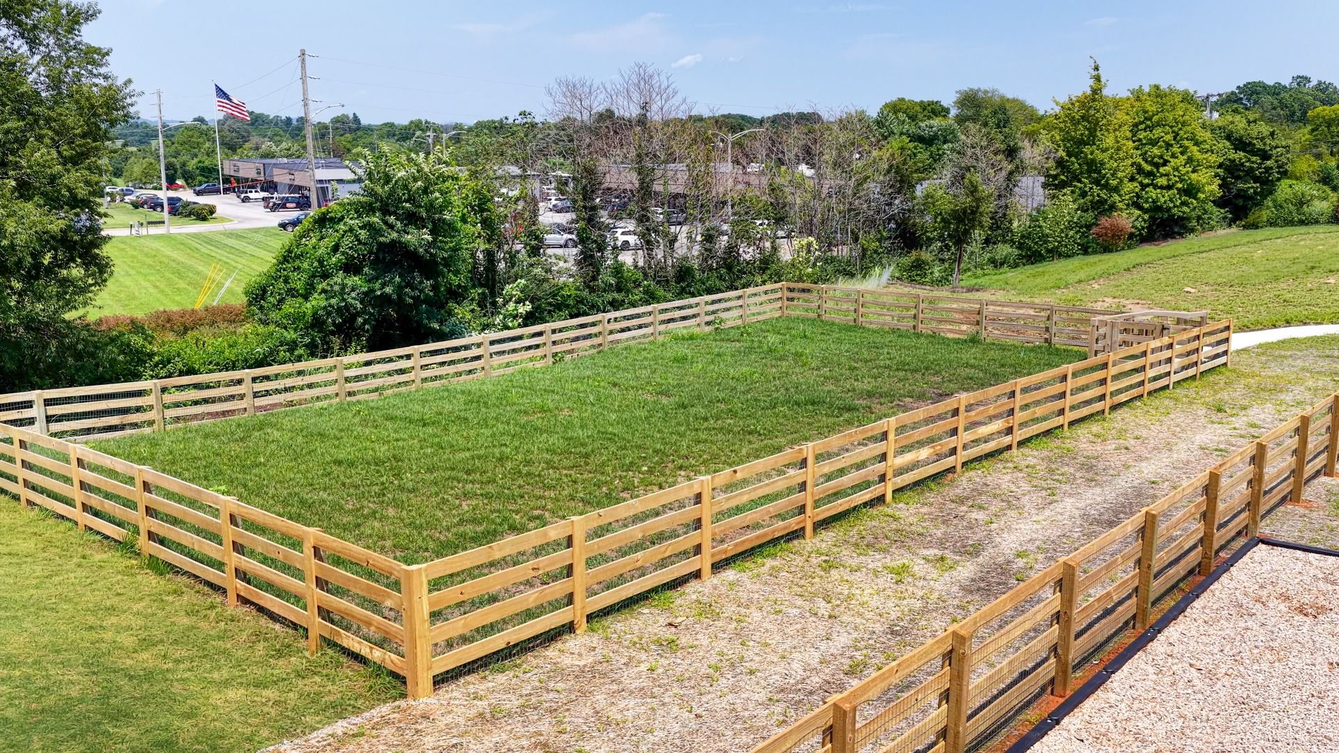 Enclosed grass area community dog park