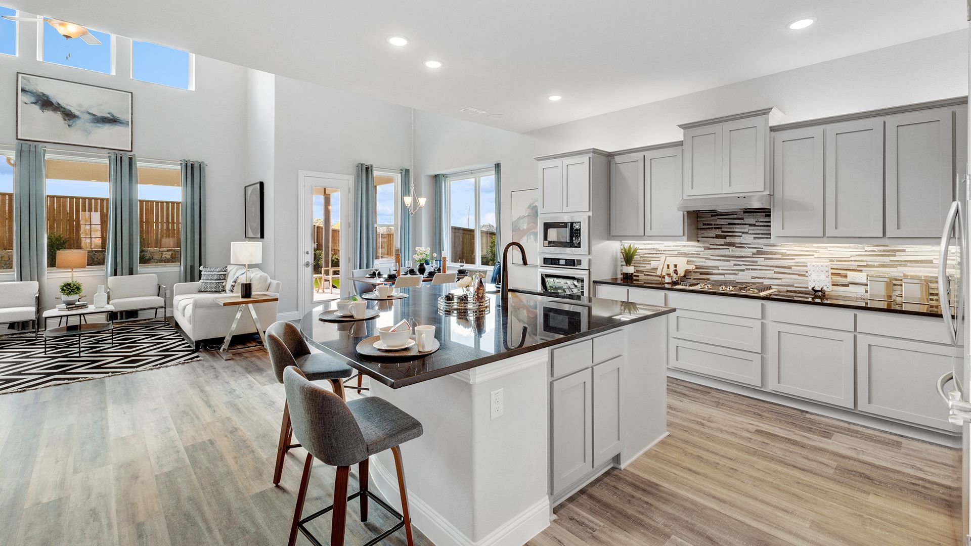 Model home photos of similar floorplans, not pictures of actual home.