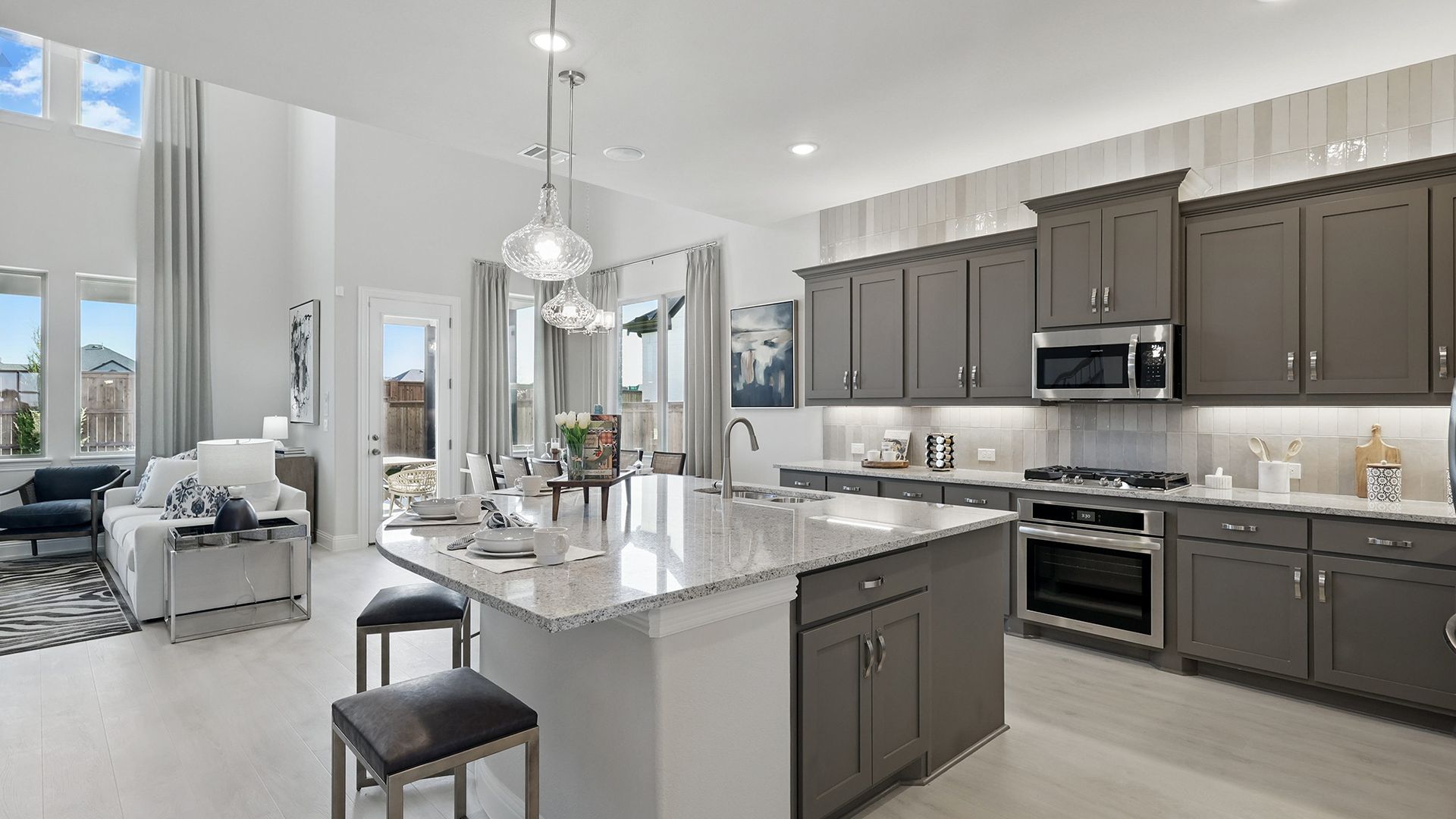 Model home photos of similar floorplans, not pictures of actual home.