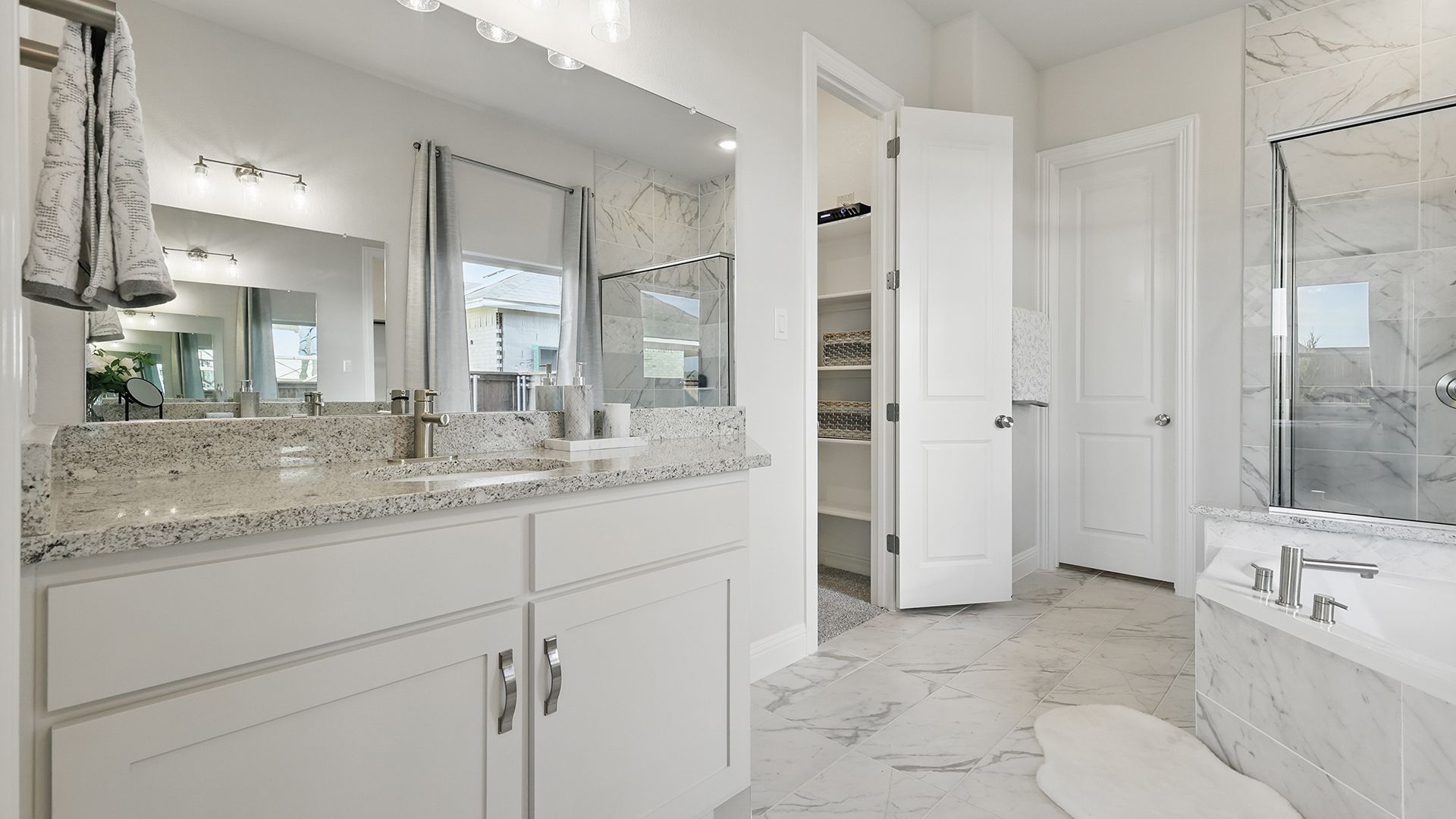 Model home photos of similar floorplans, not pictures of actual home.