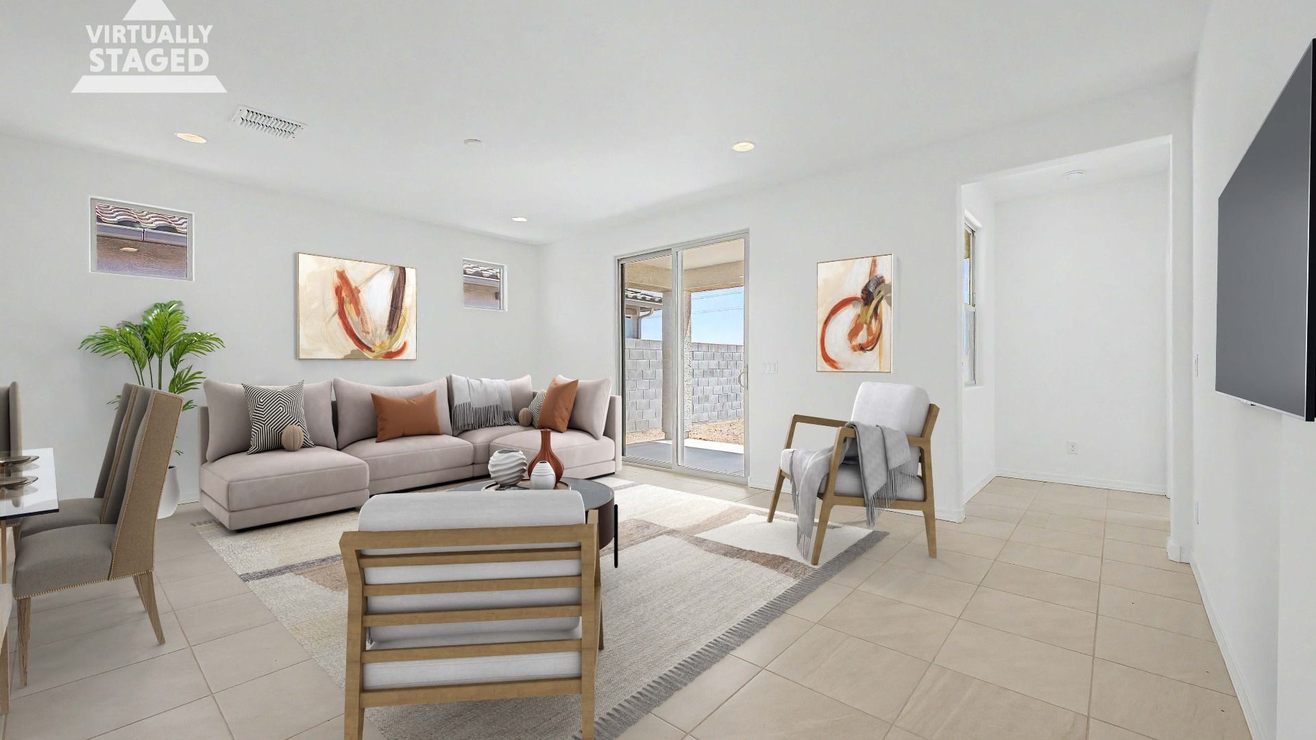 Bright, virtually staged great room in this quick move-in home by DRB Homes at Saguaro Hills at Vistancia, 32371 N 123rd Dr.