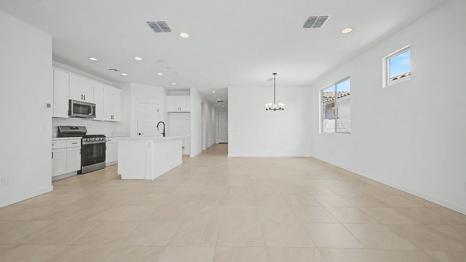 Spacious open living areas in this quick move-in home by DRB Homes at Saguaro Hills at Vistancia, 32371 N 123rd Dr, Peoria AZ