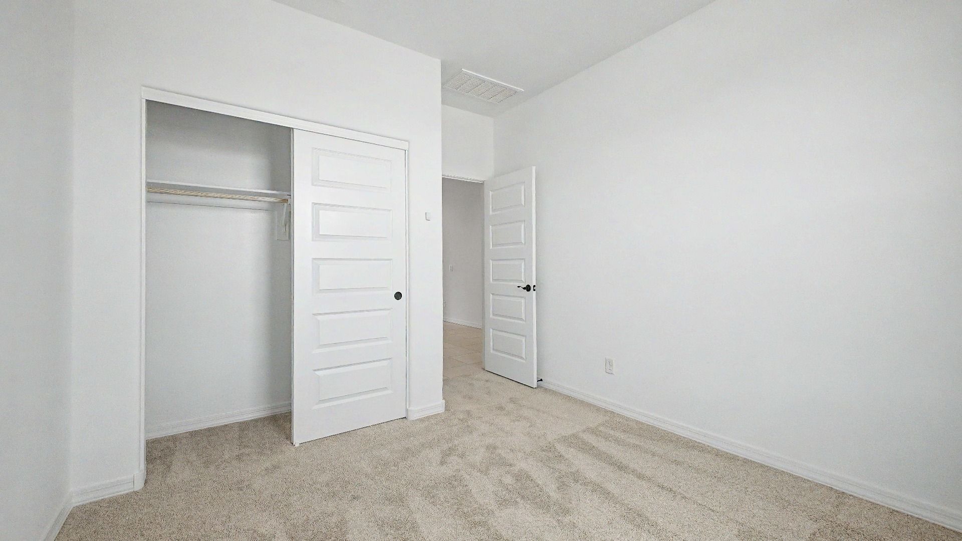 Versatile secondary bedroom & closet in this quick move-in home by DRB Homes at Saguaro Hills at Vistancia, 32371 N 123rd Dr.