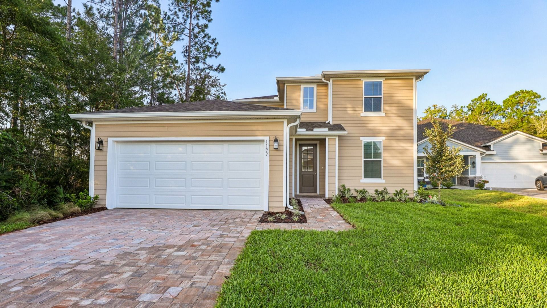 Stranahan Floor Plan Front Exterior Coastal Elevation by DRB Homes in Panther Creek, FL