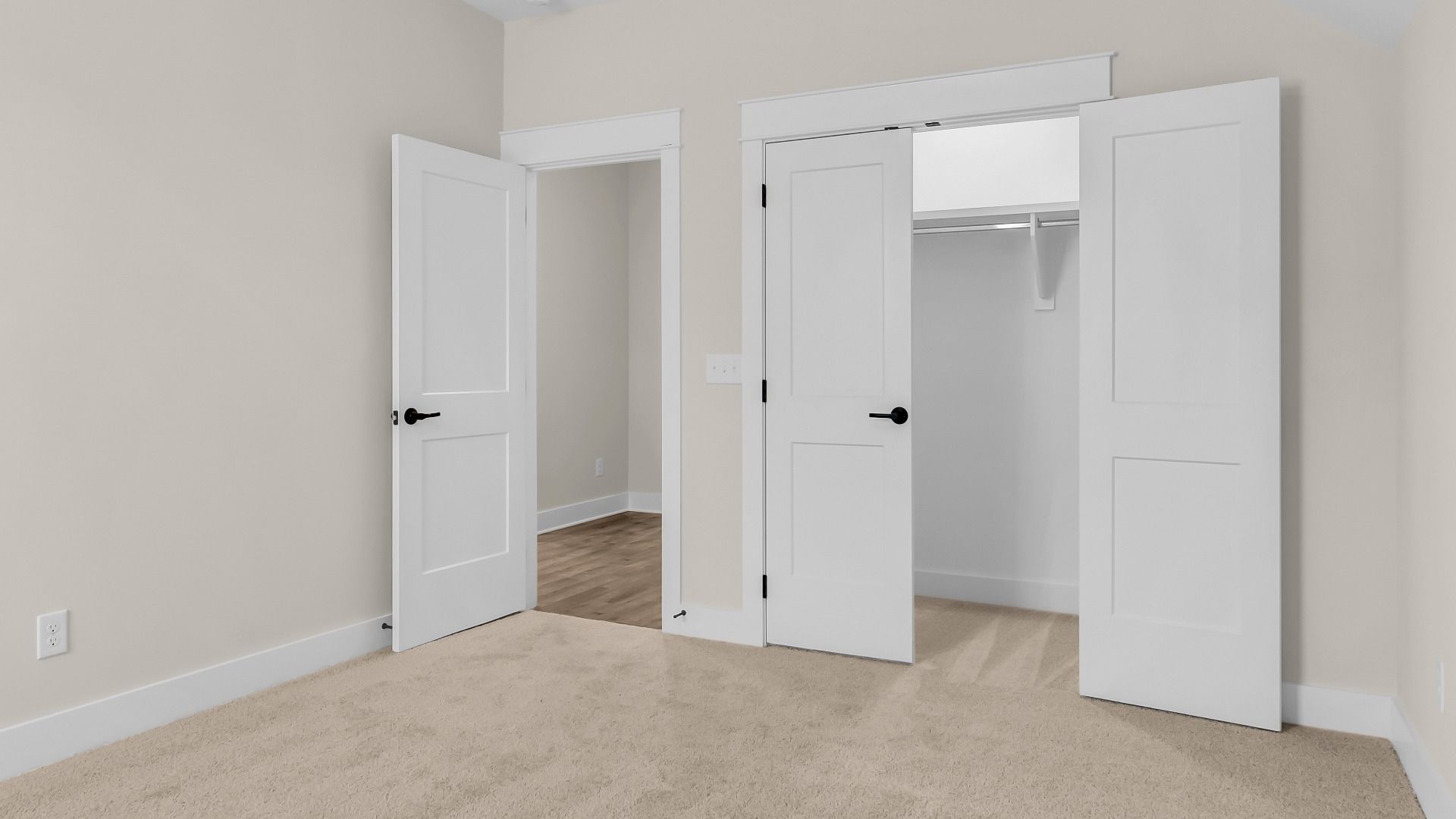 Carpeted secondary bedroom (Representative of finished home)