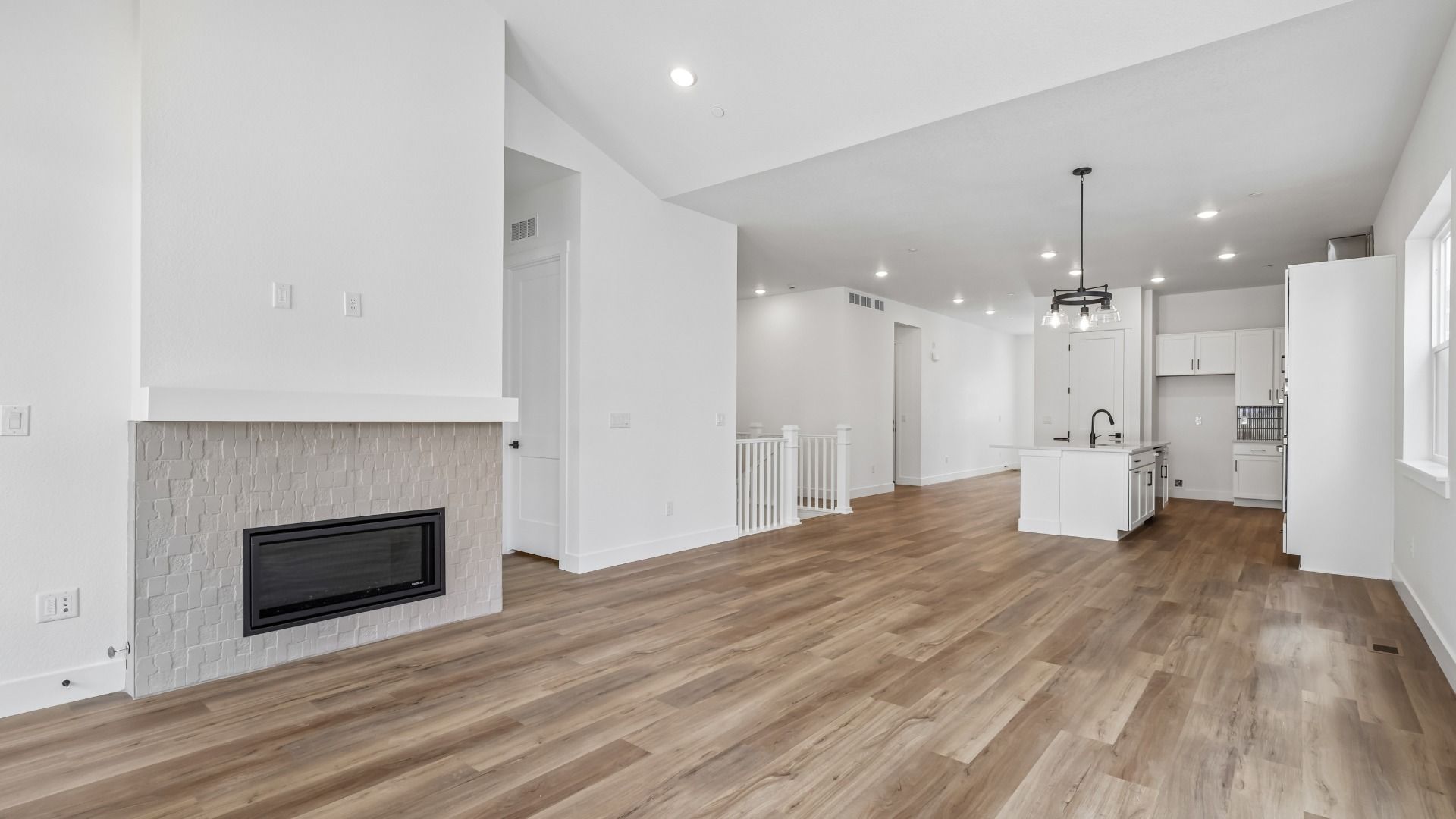 Fireplace adds warmth and character to this welcoming great room