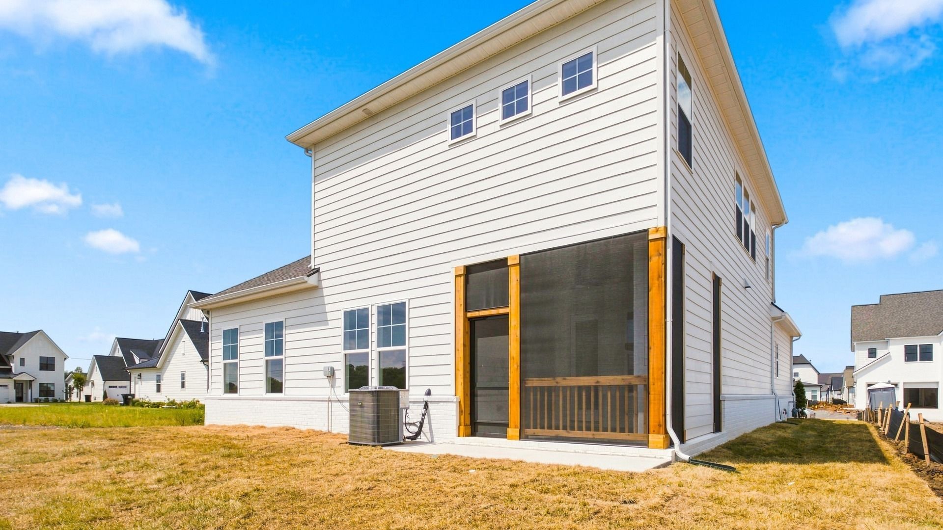 Backyard view of home and of the community.