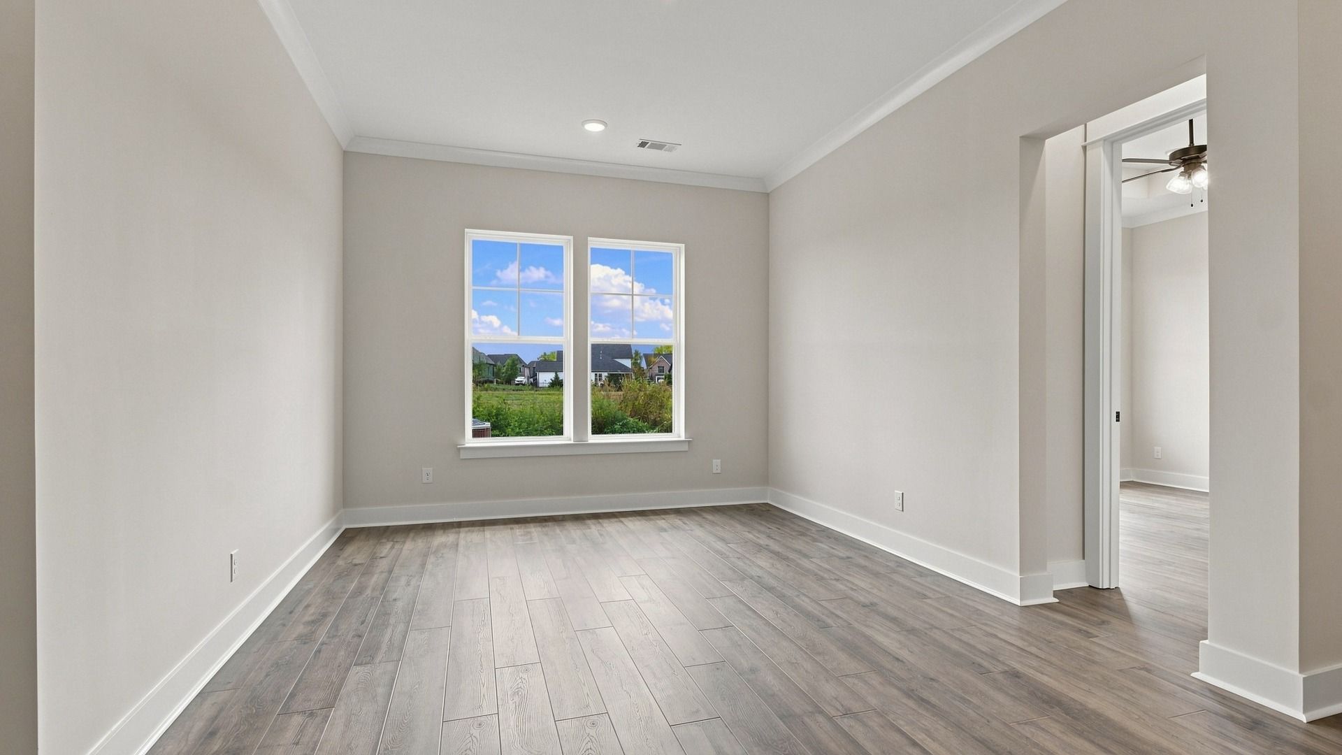 Upstairs spacious area with window.