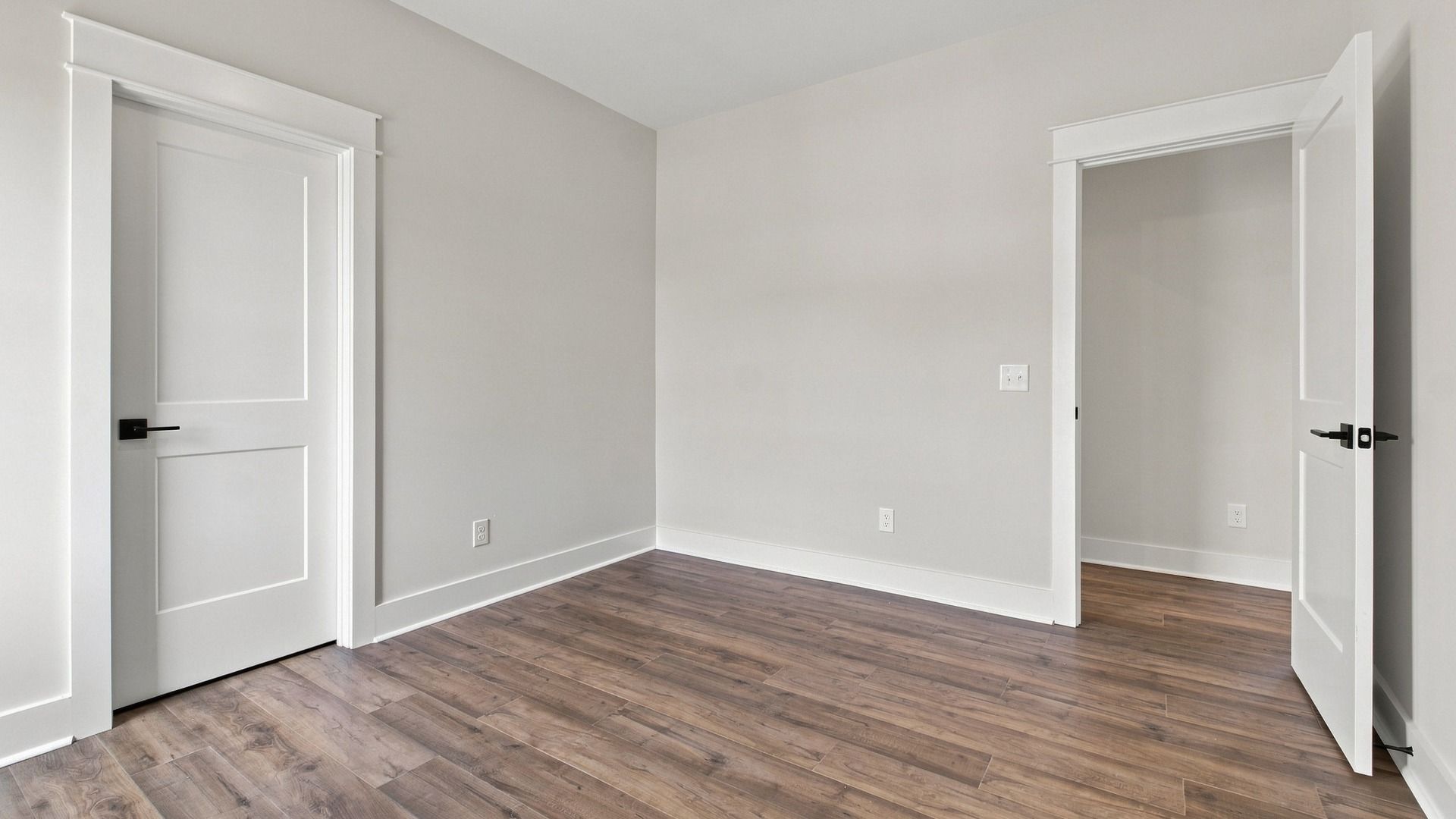 View of upstairs bedroom door and closet.