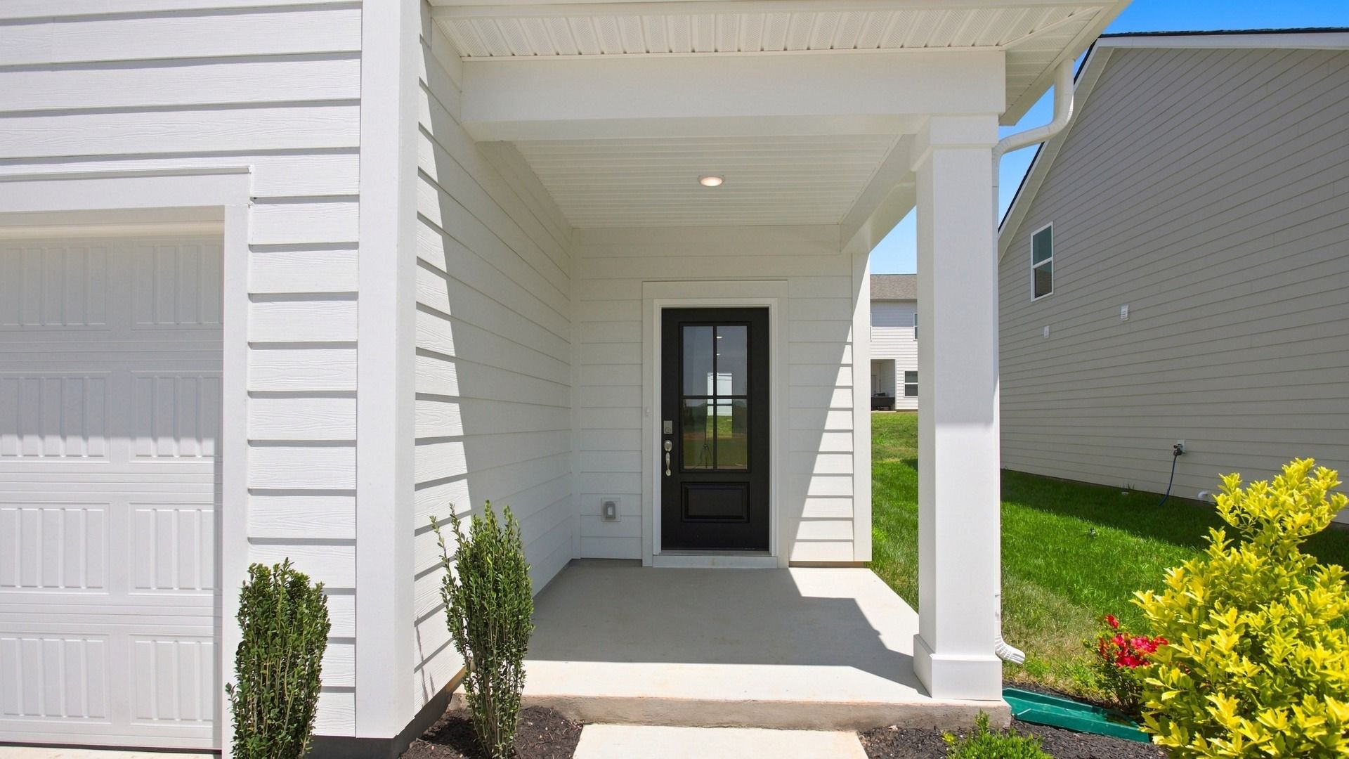 Closer view of porch and front door