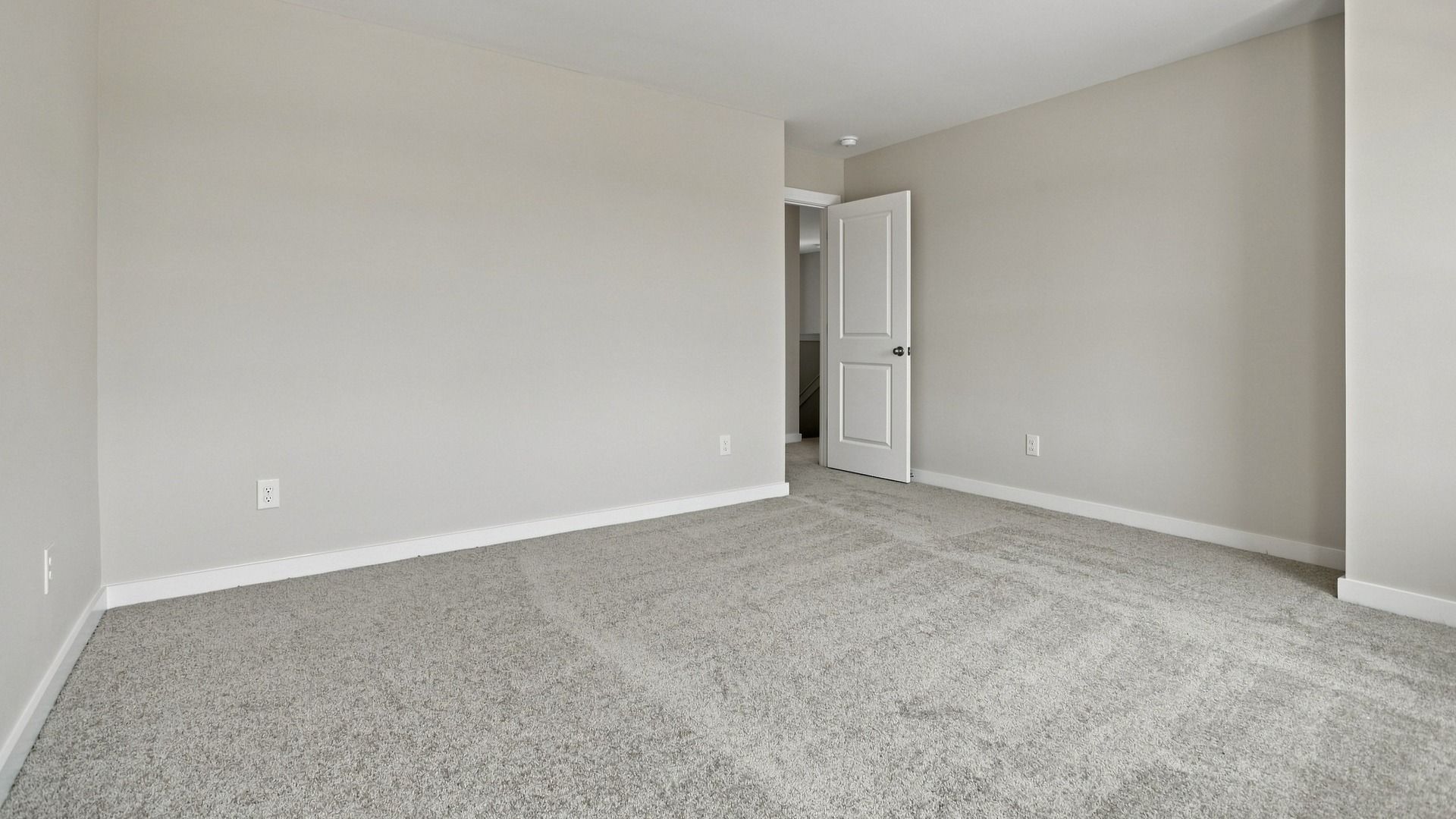 Spacious secondary bedroom with versatile design opportunities