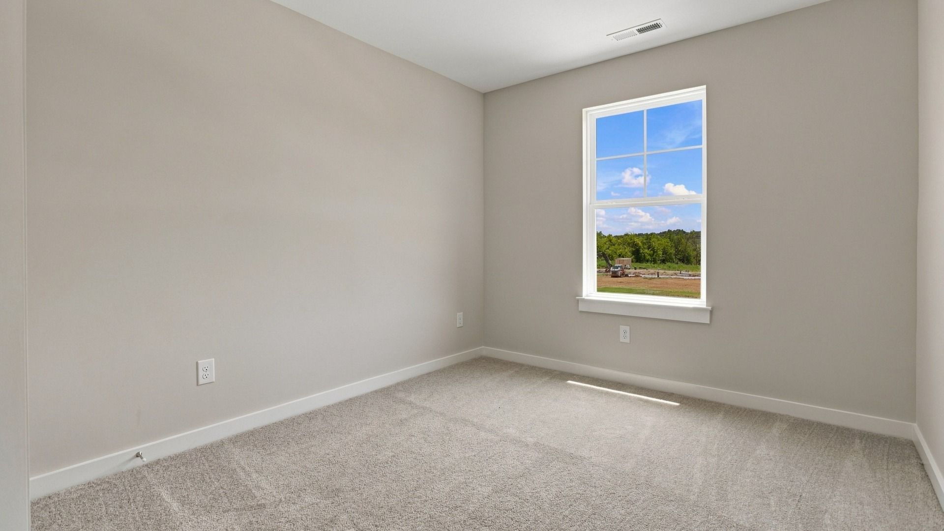 Secondary bedroom with window and versatile living options