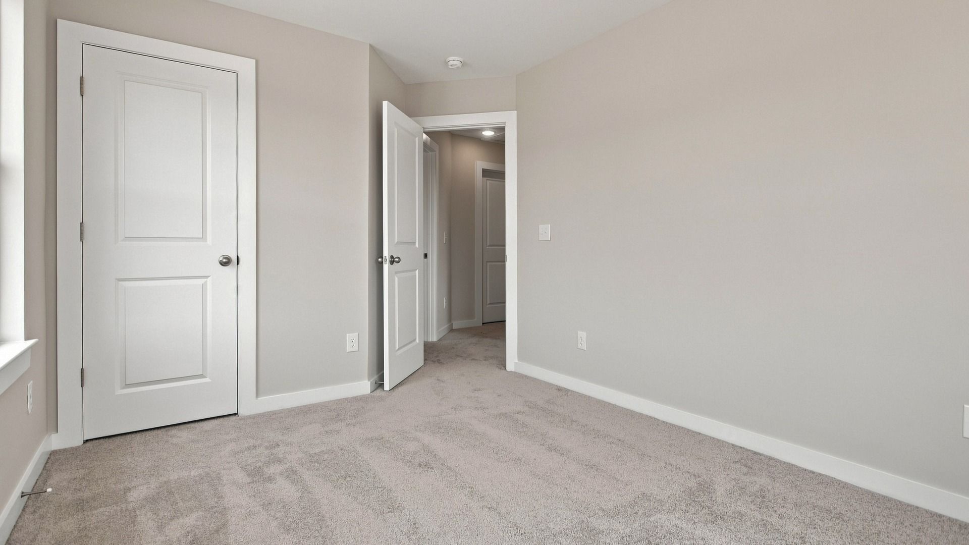 Secondary closet and room entryway from windows