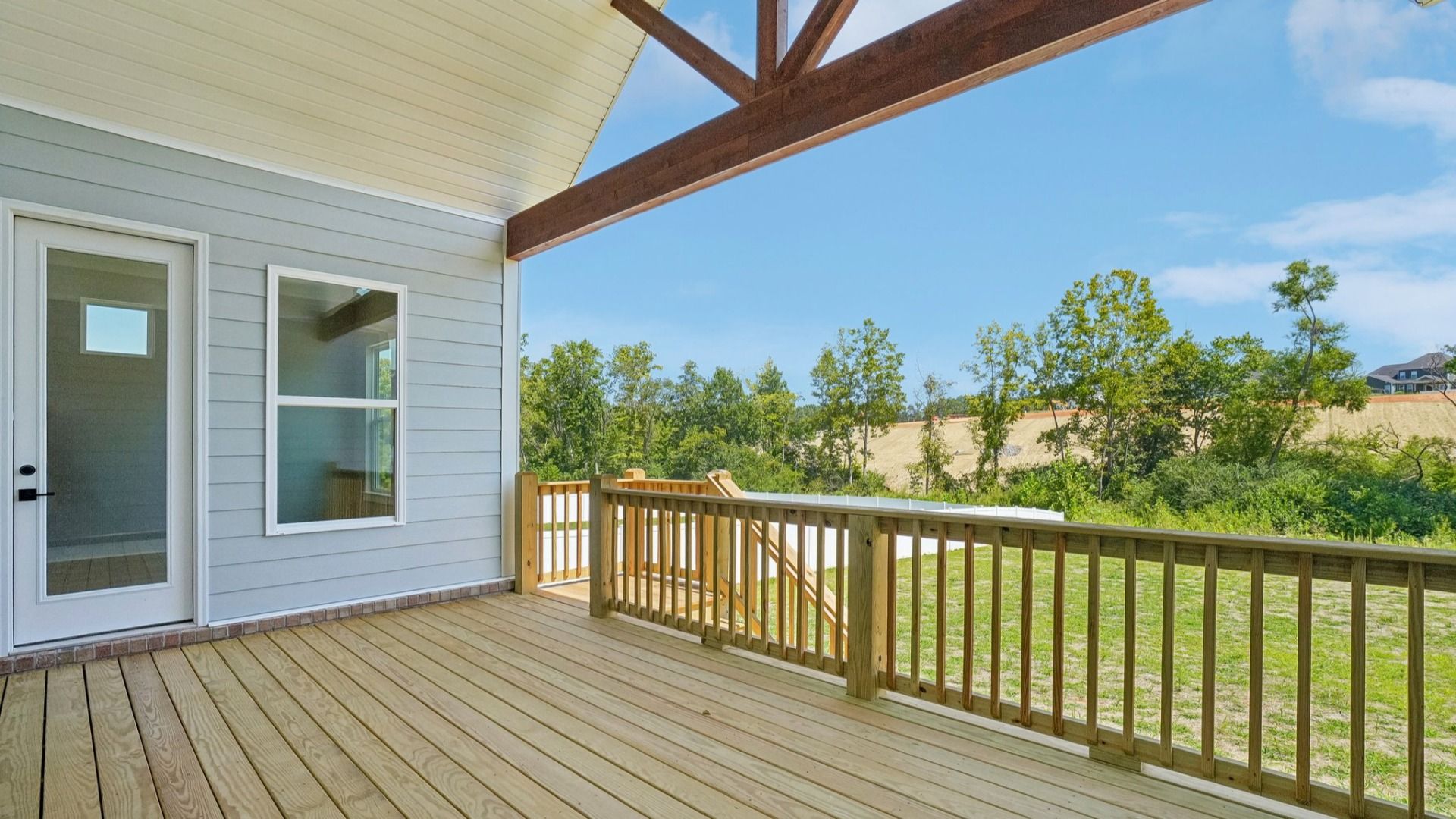 Peaceful viewing of backyard on porch