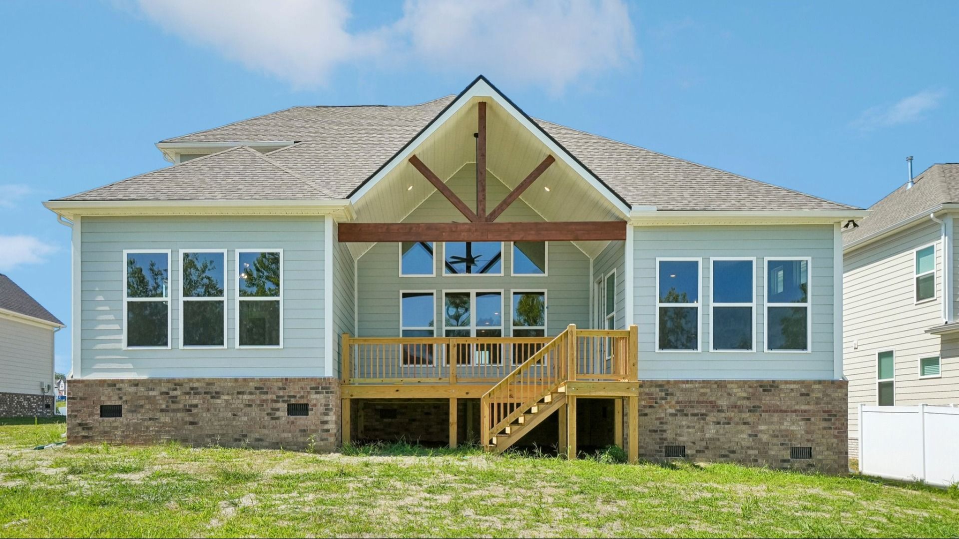 Two-story home rear exterior with porch