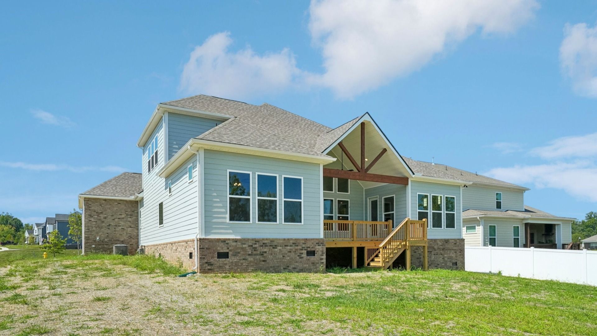 Two-story home rear exterior with porch